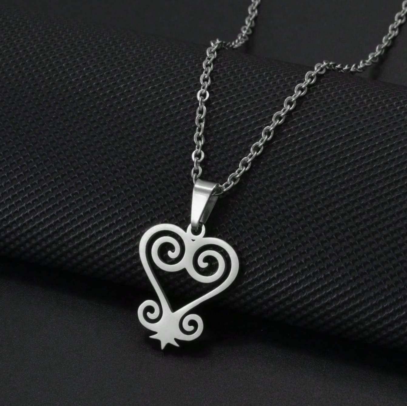 Womens silver sankofa Adinkra necklace