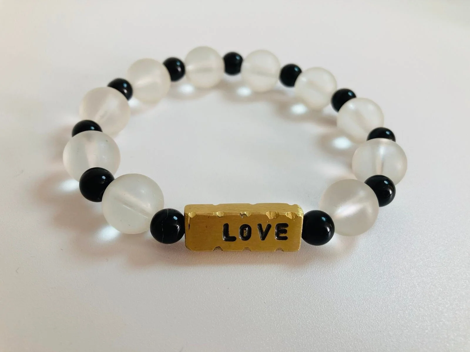 Love clear glass bead bracelet