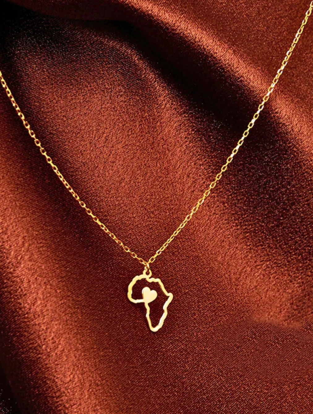 Women’s Gold Africa map heart necklace 1.1 - Style Me African.png