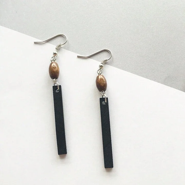 Slim-lined wooden black earrings