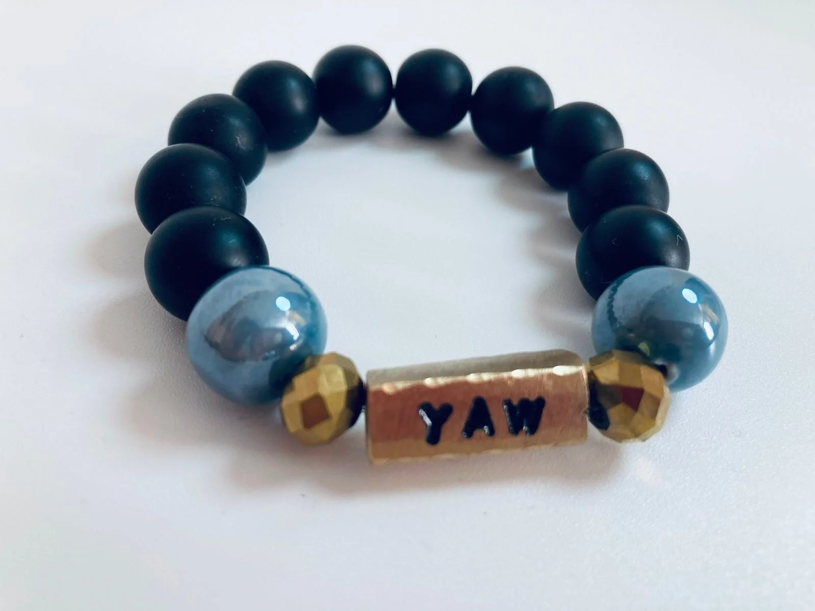 Yaw Thursday born glass bead make bracelet
