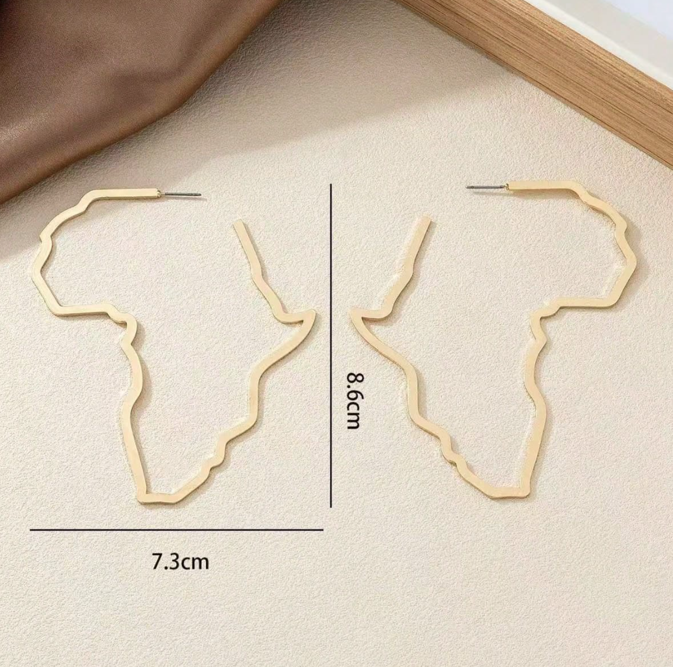 Gold Africa map stencil earring 1.4 - Style Me African.png