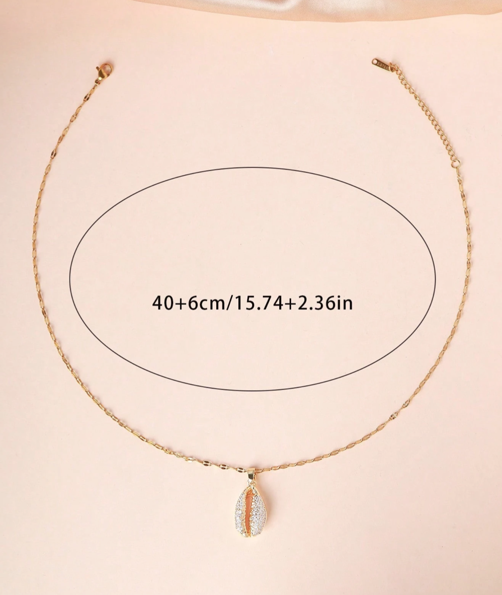 SGold cowrie shell diamonte necklace 1.3 - Style Me African.png