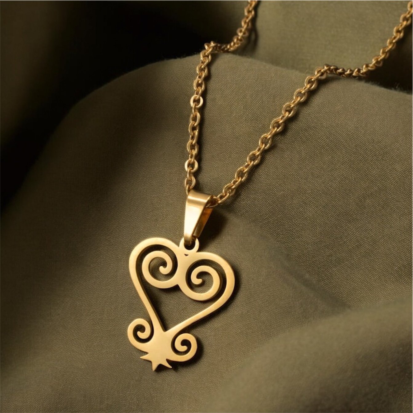Gold sankofa Adinkra necklace1.1. - Style Me African.jpeg