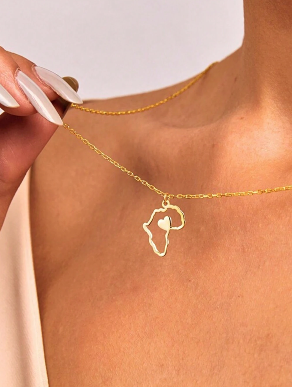 Women’s Gold Africa map heart necklace 1.3 - Style Me African.png