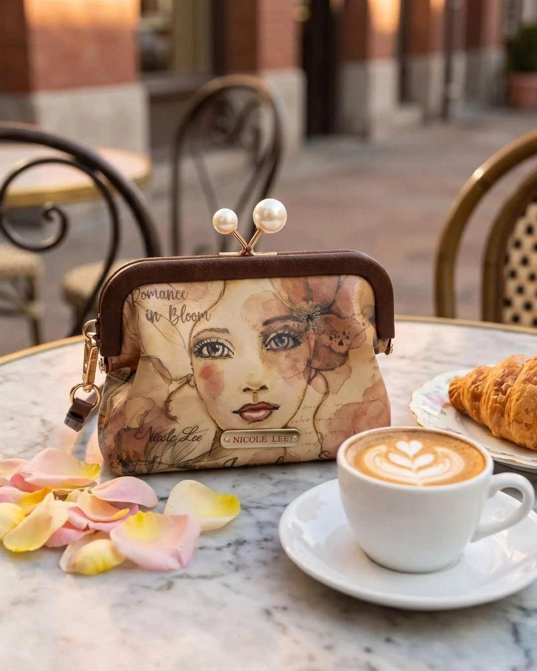 Chic, compact, and effortlessly elegant ✨ The Chelsea Pearl Purse features a pearl kiss-lock closure, card slots, and an optional wristlet strap for hands-free style anywhere you go 🤍

Chelsea Pearl Coin Purse available now in link in bio!

#nicolel