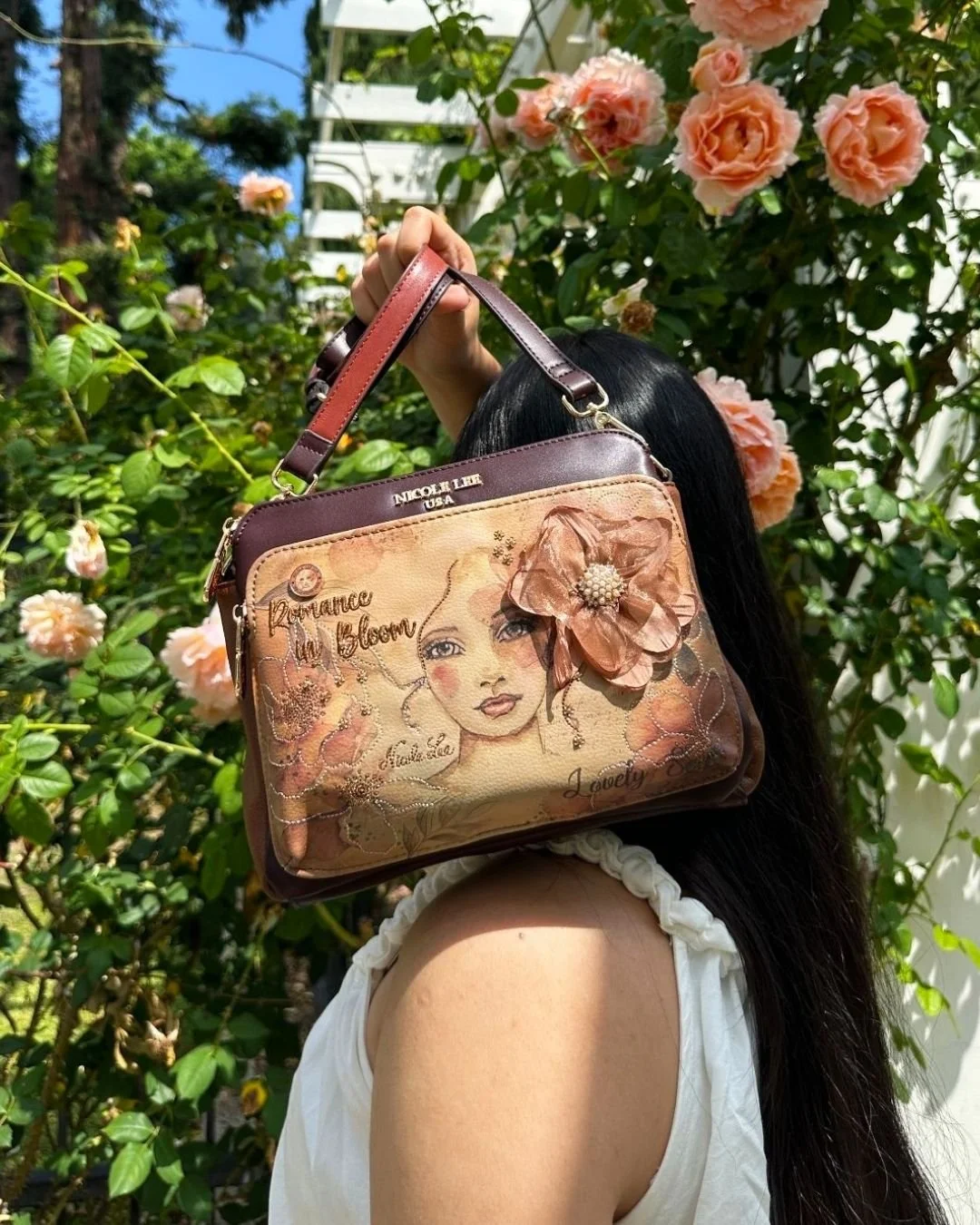 A charming crossbody designed with a structured silhouette and a Reflection of Love, delicate floral accent details, and an adjustable strap for effortless hands-free style wherever the day takes you. 🌸

Find the Reflection of Love Crossbody Bag in 