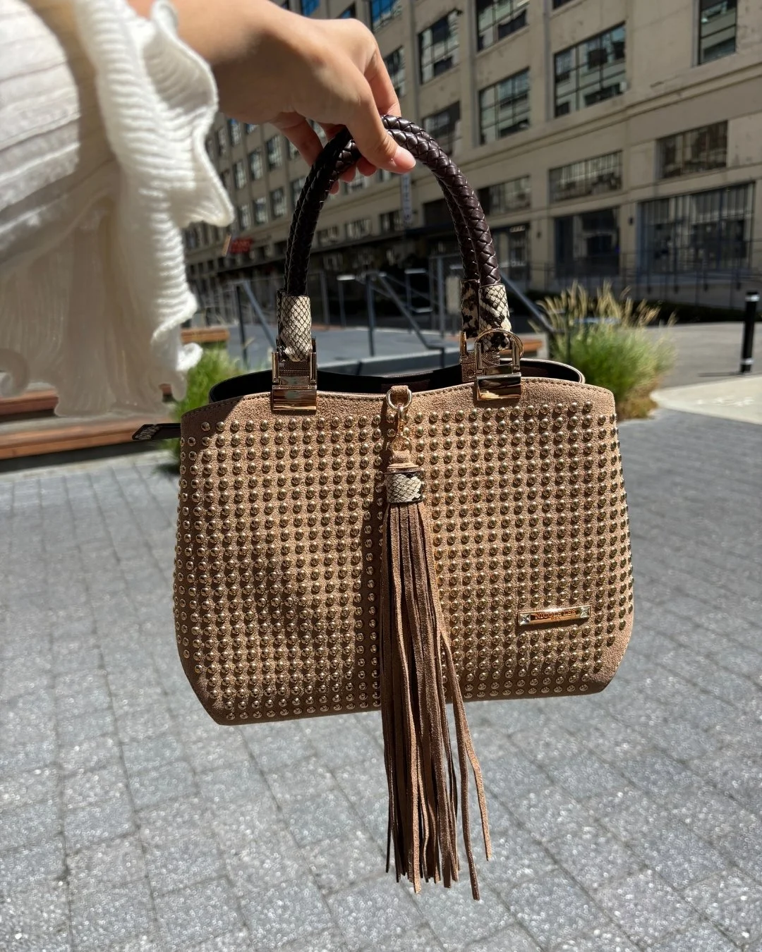 Made to steal the spotlight.

Find the Studded Glam Satchel Bag in link in bio.

#nicoleleeusa #handbag #satchelbag #fw26