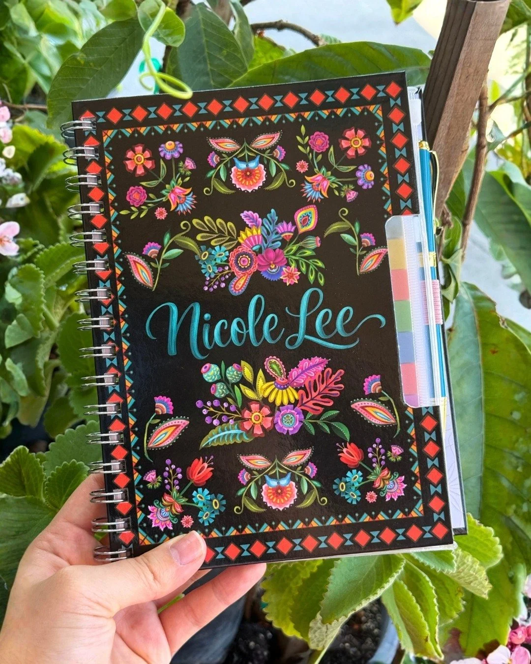 Say hello to your new must-have accessory! Our compact yearly planner fits perfectly in your bag, making them ideal for work or on-the-go. With convenient sticky notes, pen and pen holder included, this planner keeps you organized and chic all year l