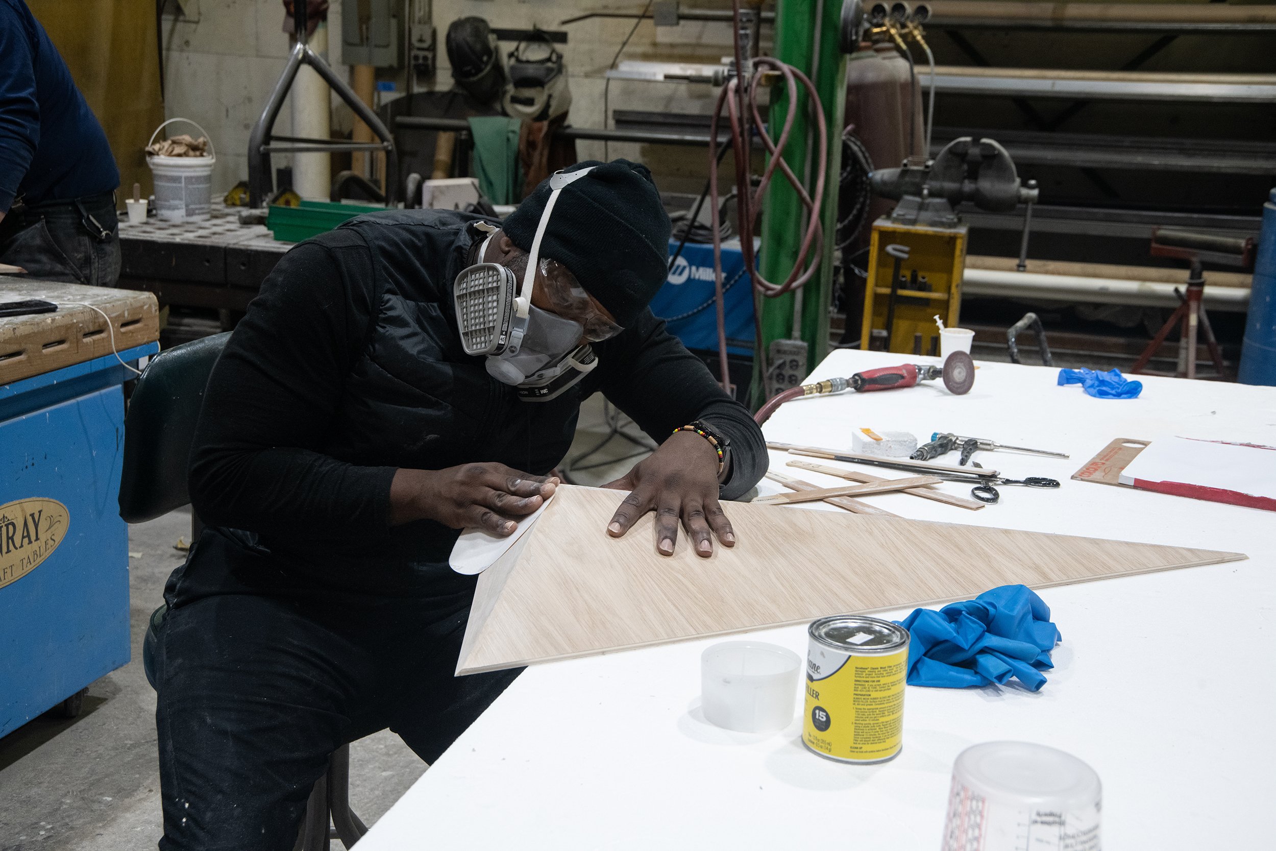 api-sculpture-fabrication-sanding-02.jpg