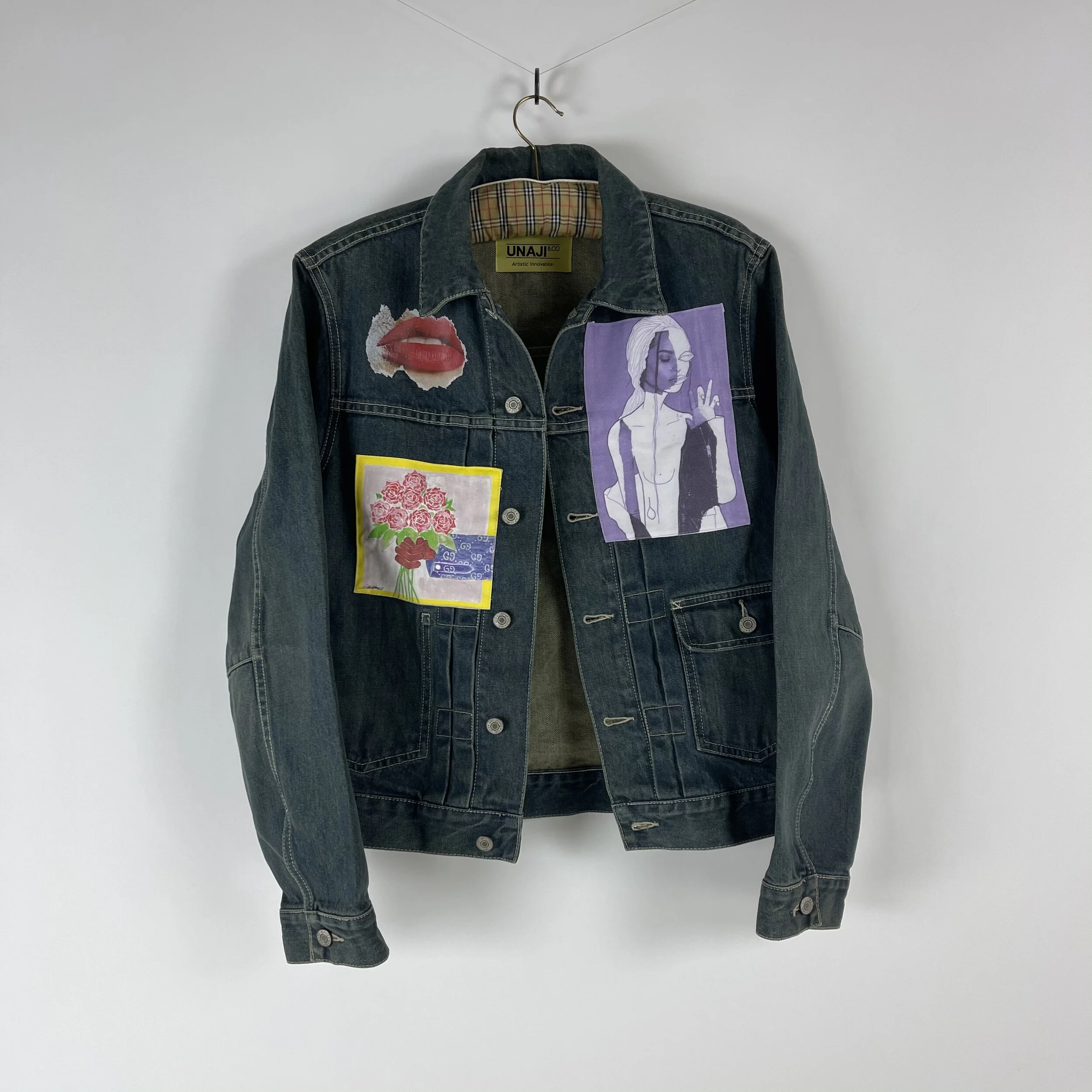Blue Denim Jacket - Passion & PoisonUp-cycled denim jacket combining signature unaji Pop Art with graphics and bold text. The theme of passion becoming poison, finding a balance.