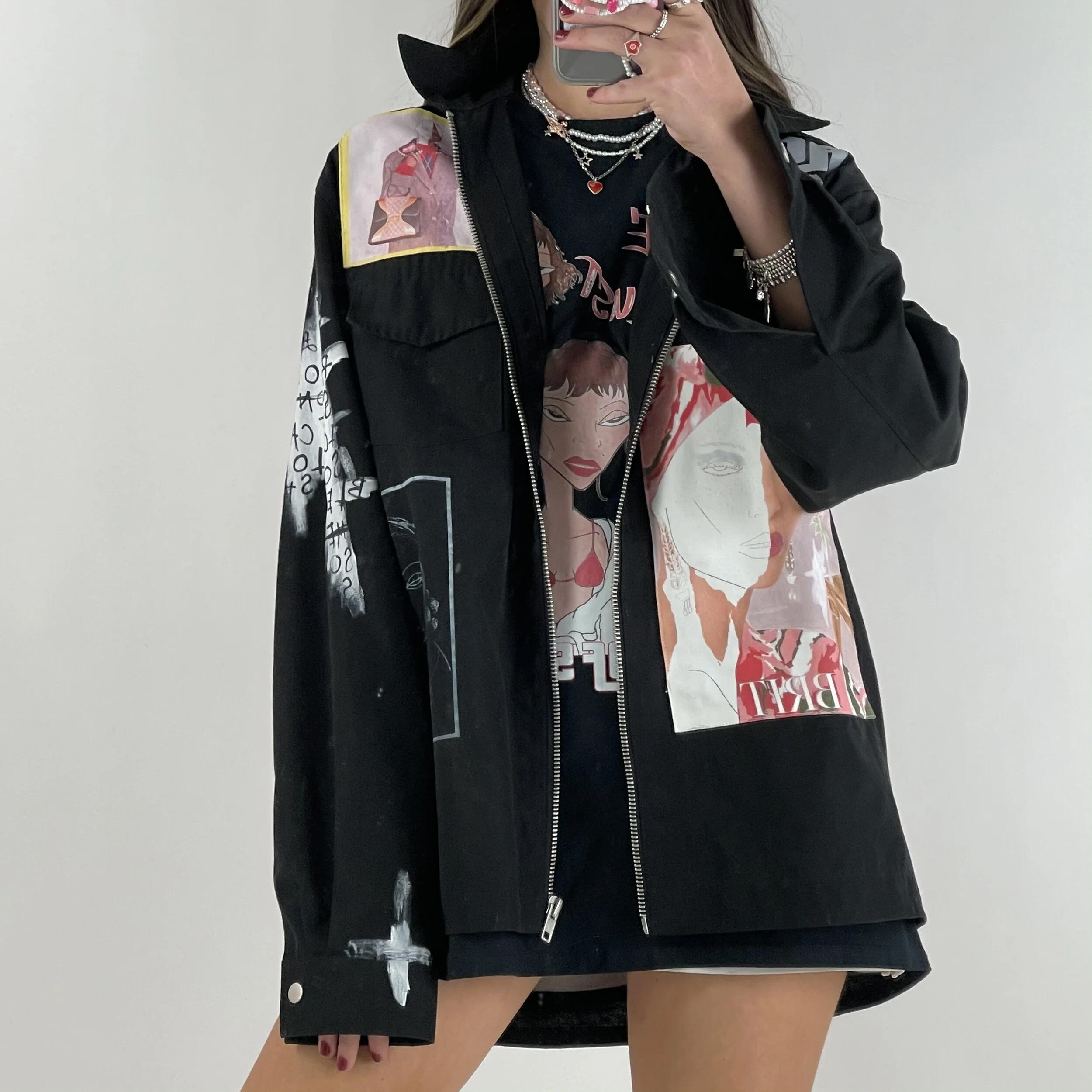 Black Workwear Jacket - Love or LustUp-cycled work wear jacket combing signature Unaji artworks attached as patchwork with printed graphics and bold text. 