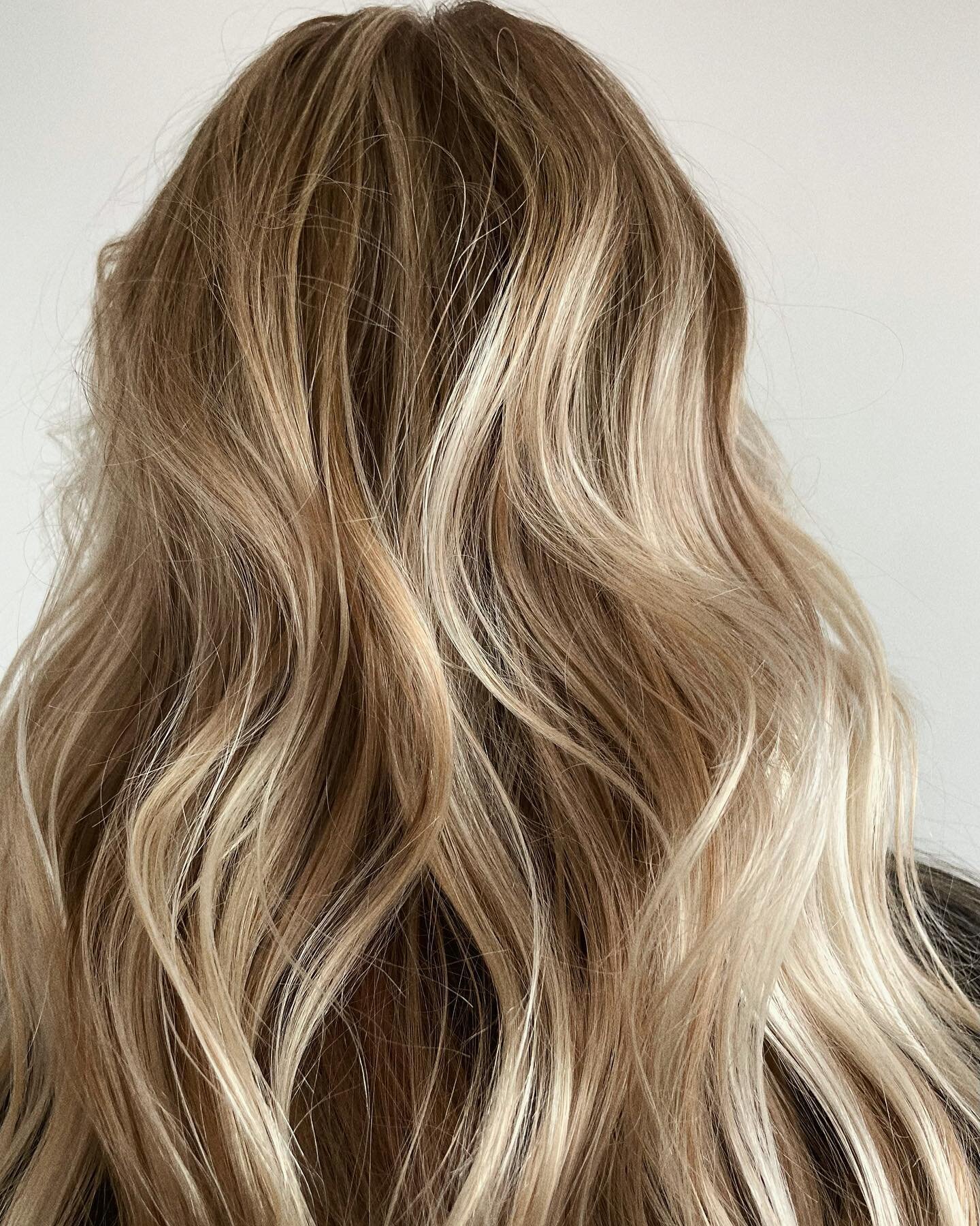 BLONDE 
pops of brightness are essential to making your blonde standout. 

While your root toner sits, I like to wet balayage the hair if it needs an extra kick. This means adding lightener in a strategic way to add brightness in those areas that nee