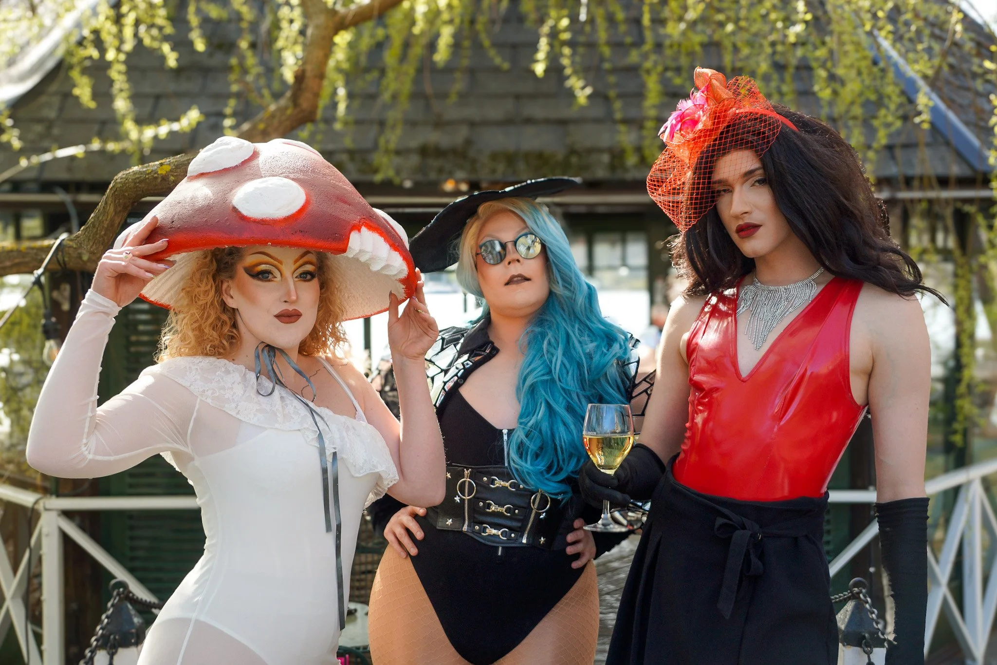 Hattparaden winner (left) with a toadstool hat with friends on the bridge to the iconic Mälarpaviljongen on Lake Mälaren.
