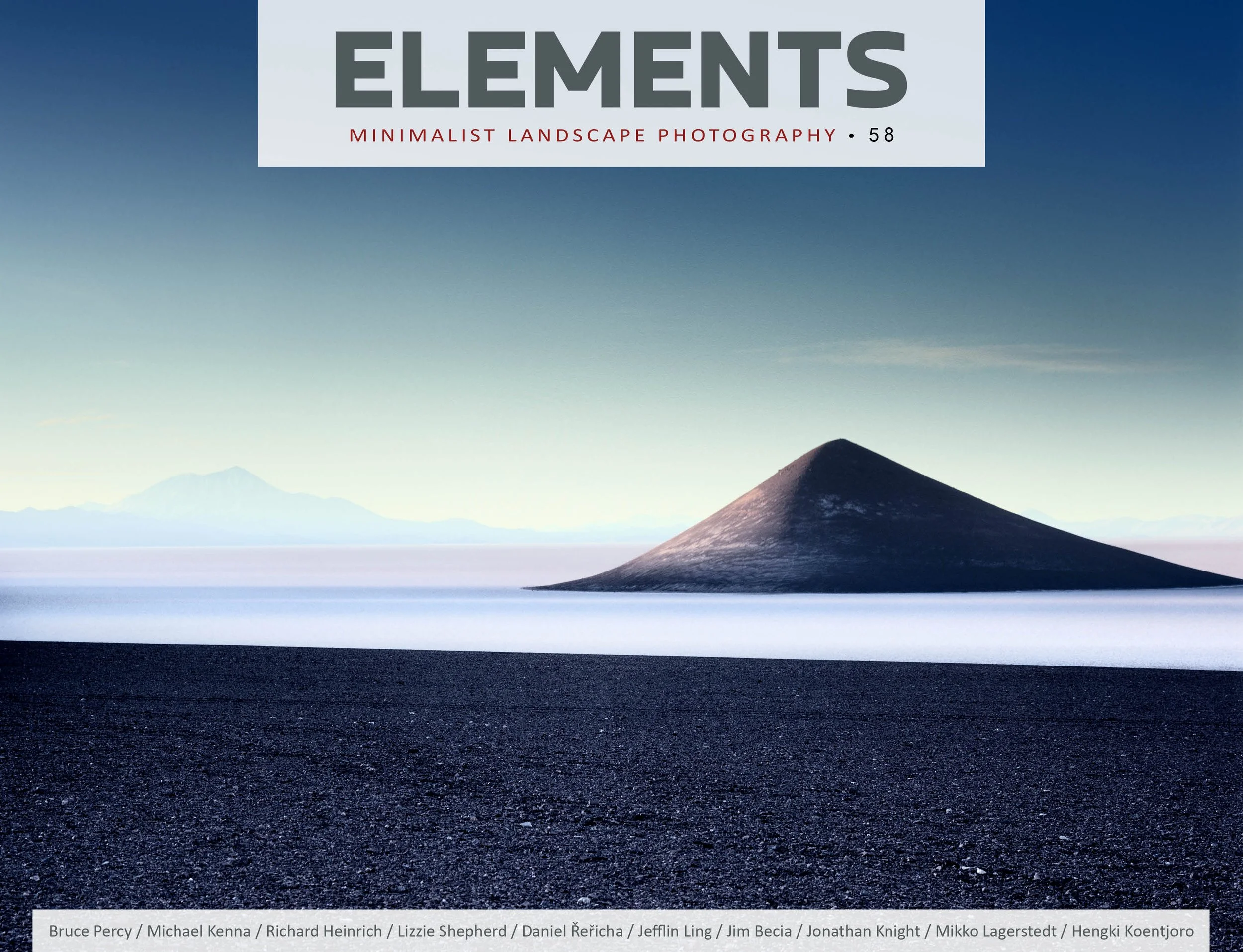 Cover of a book titled "Elements" featuring a minimalist landscape photograph of a volcanic mountain surrounded by water and a clear sky.