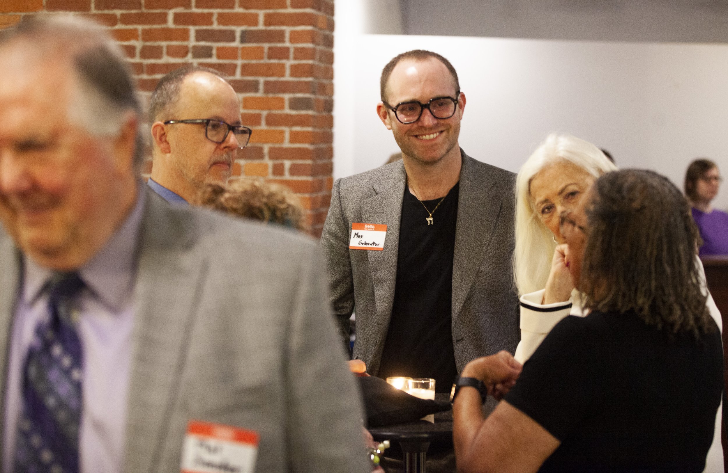  Guests and volunteers mingling.