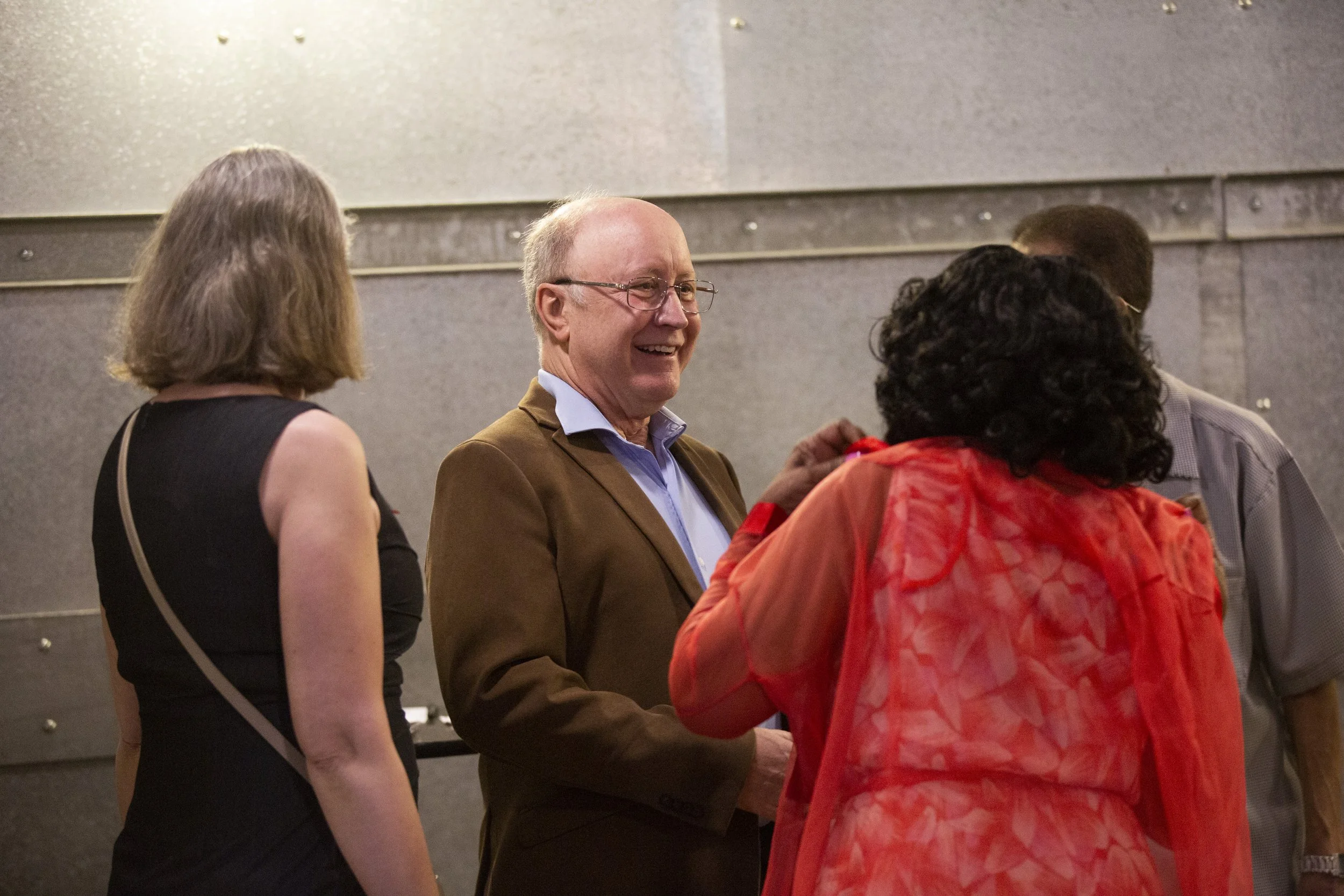  Scott Hanley and guests mingling.