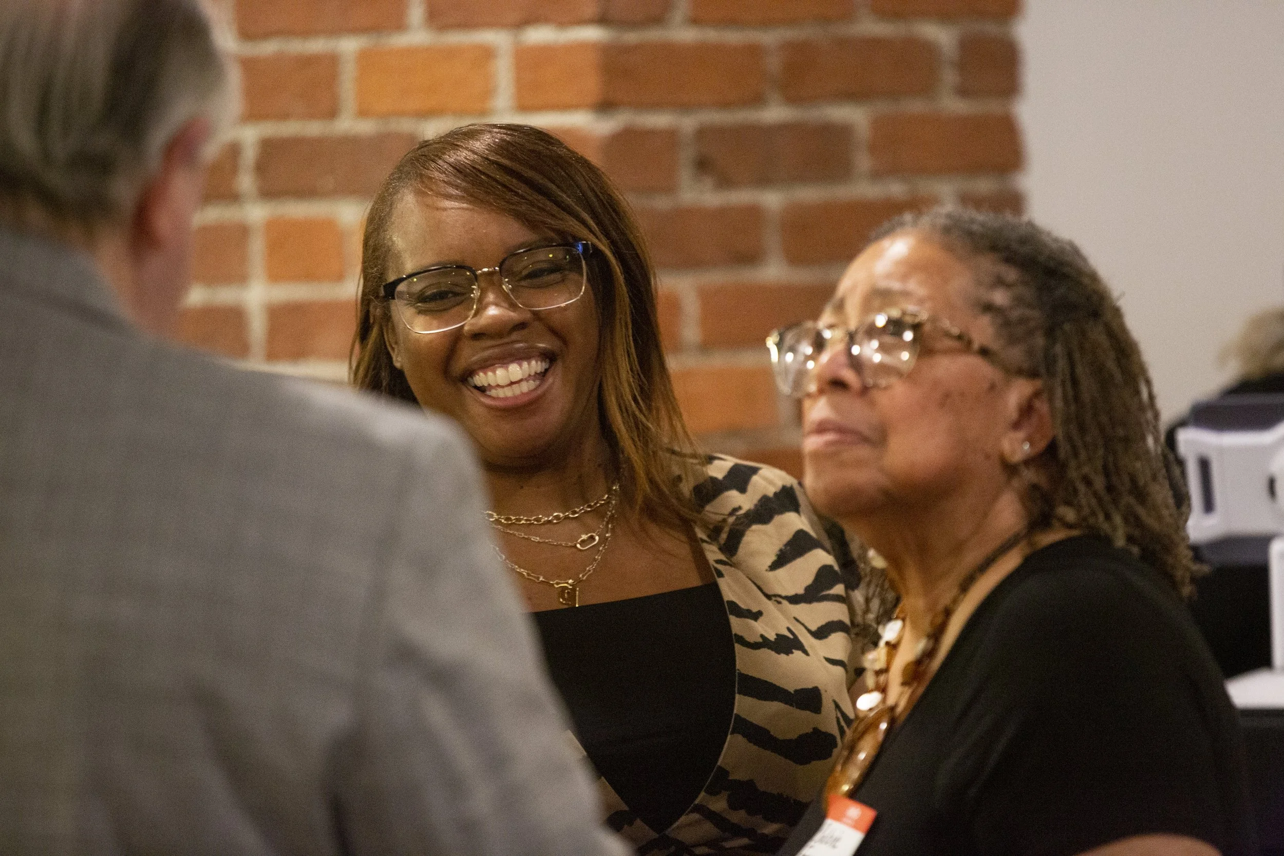 Bobbie and guests mingling.