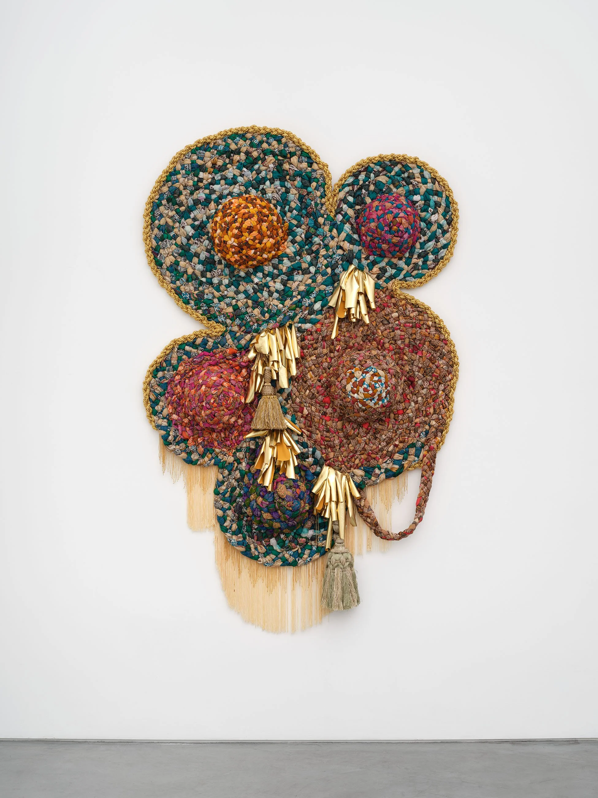 circular thinking II, 2024, worn saris, fabric, tassels, and beaded trim