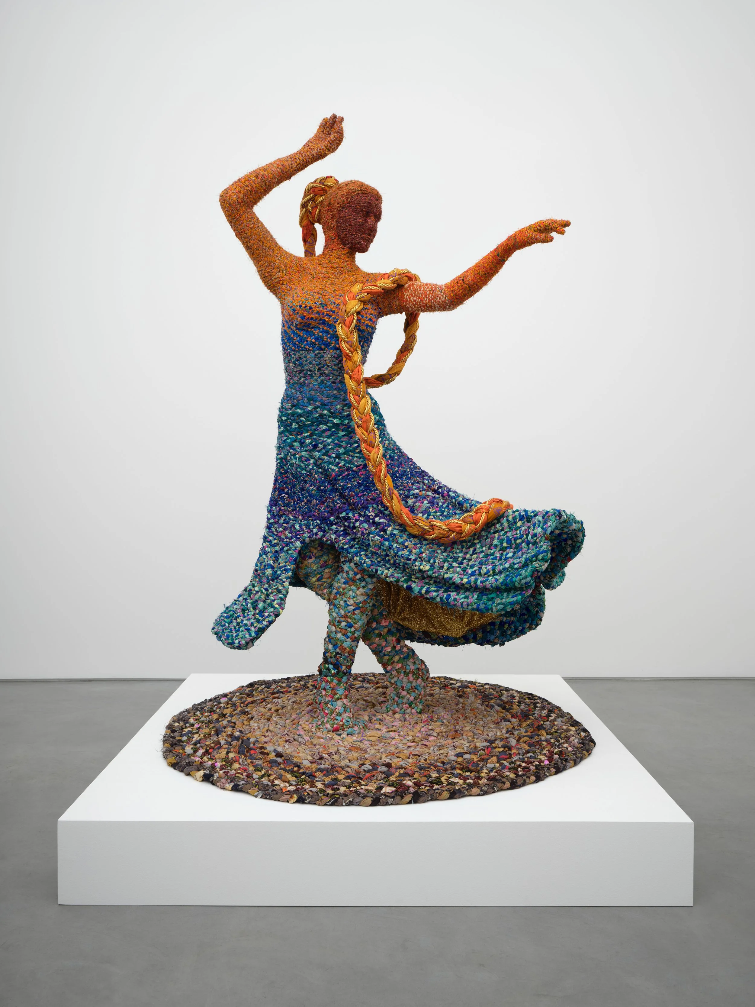 a wind, a scent, a sound, 2024, worn saris, armature, fabric, and tassels