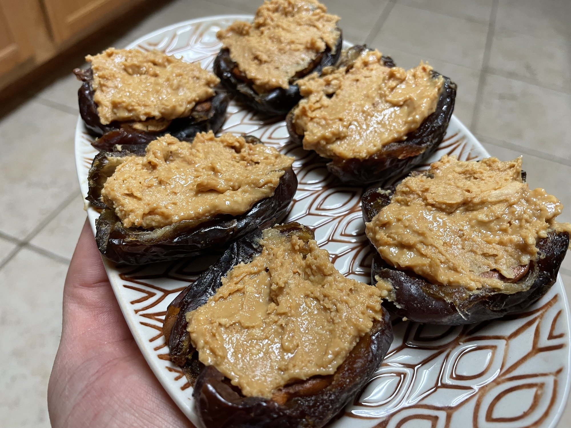 Take 5 Date Bars being assembled with peanut butter