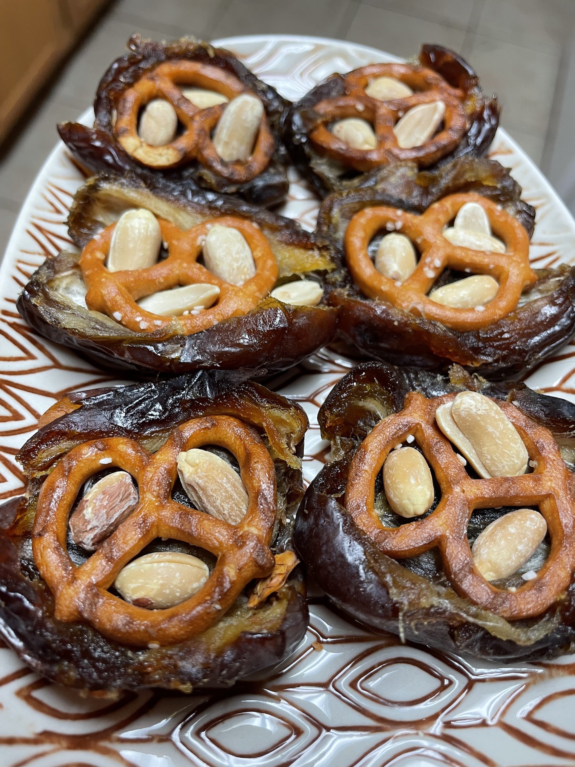 Take 5 Date Bars being assembled with pretzels and peanuts