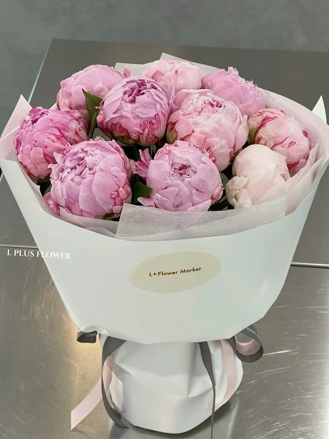 Peonies are blooming at L+ &mdash; each bouquet arranged with our signature gentle touch. Feel free to bring one home before these seasonal beauties slip away 

🌸🤍✨

#peonyflower #peonylover #peony #adelaideflorist