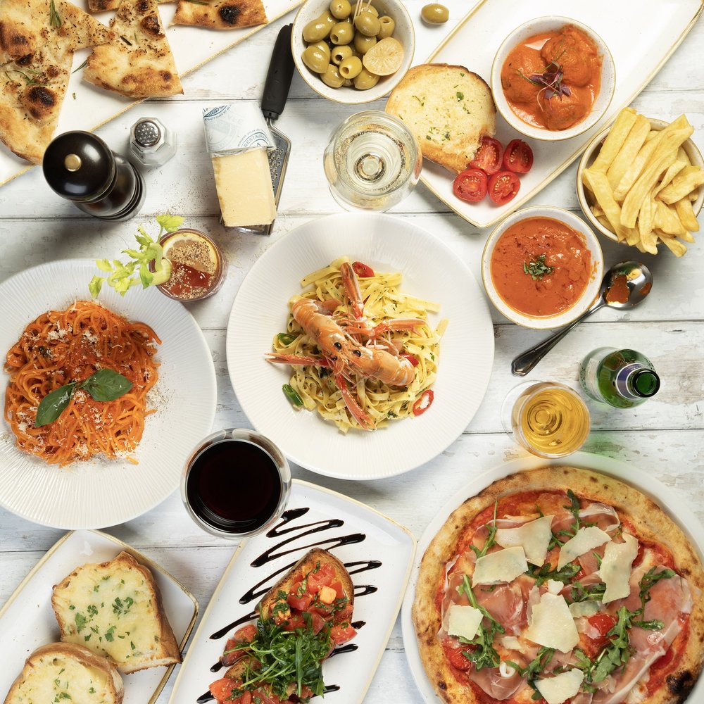 Places to Eat Near Glasgow's Big Venues: Scotstoun, Hampden, the Hydro and More 10 An overhead spread of Italian food at Coia's, including pasta, a langoustine tagliatelle, pizza and bruschetta