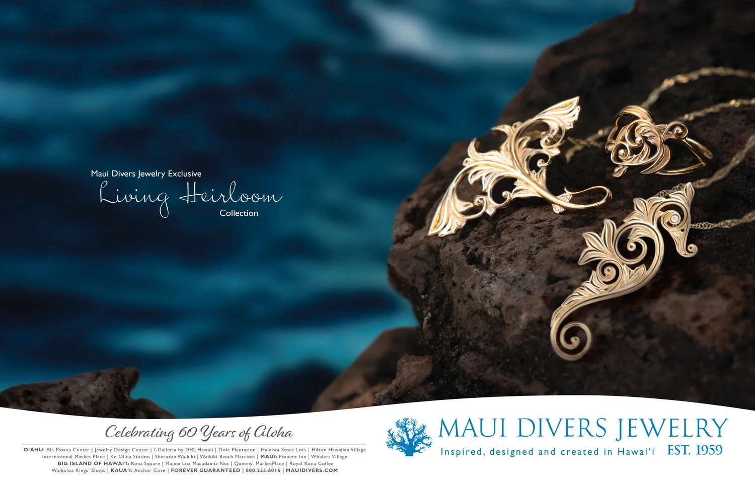 Jewelry collection featuring gold earrings and a necklace with intricate, swirling sealife designs displayed on a rock beside blue water