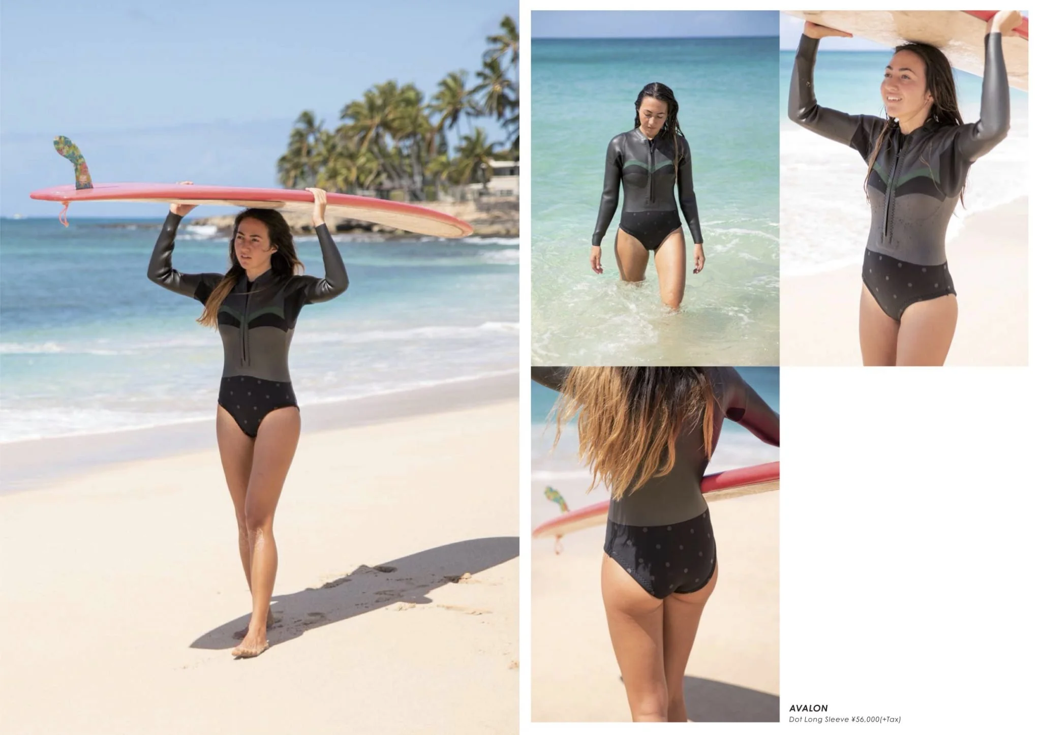A woman in a black wetsuit with a grey and green pattern walking in the ocean, carrying a pink surfboard on her head, on a beach with palm trees in the background.
