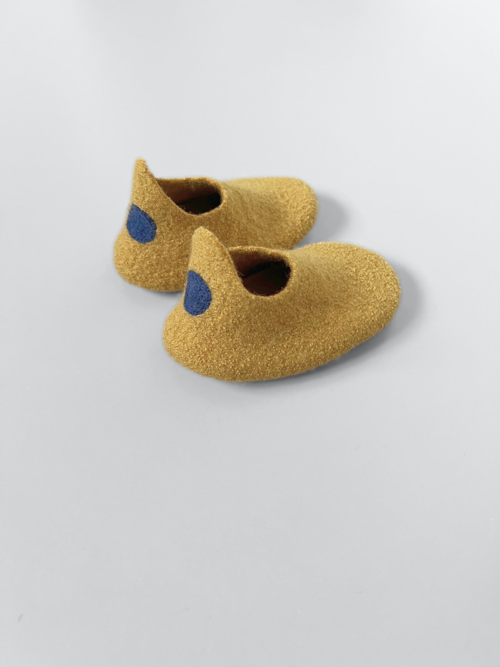 Dark Mustard boiled wool kids slippers.