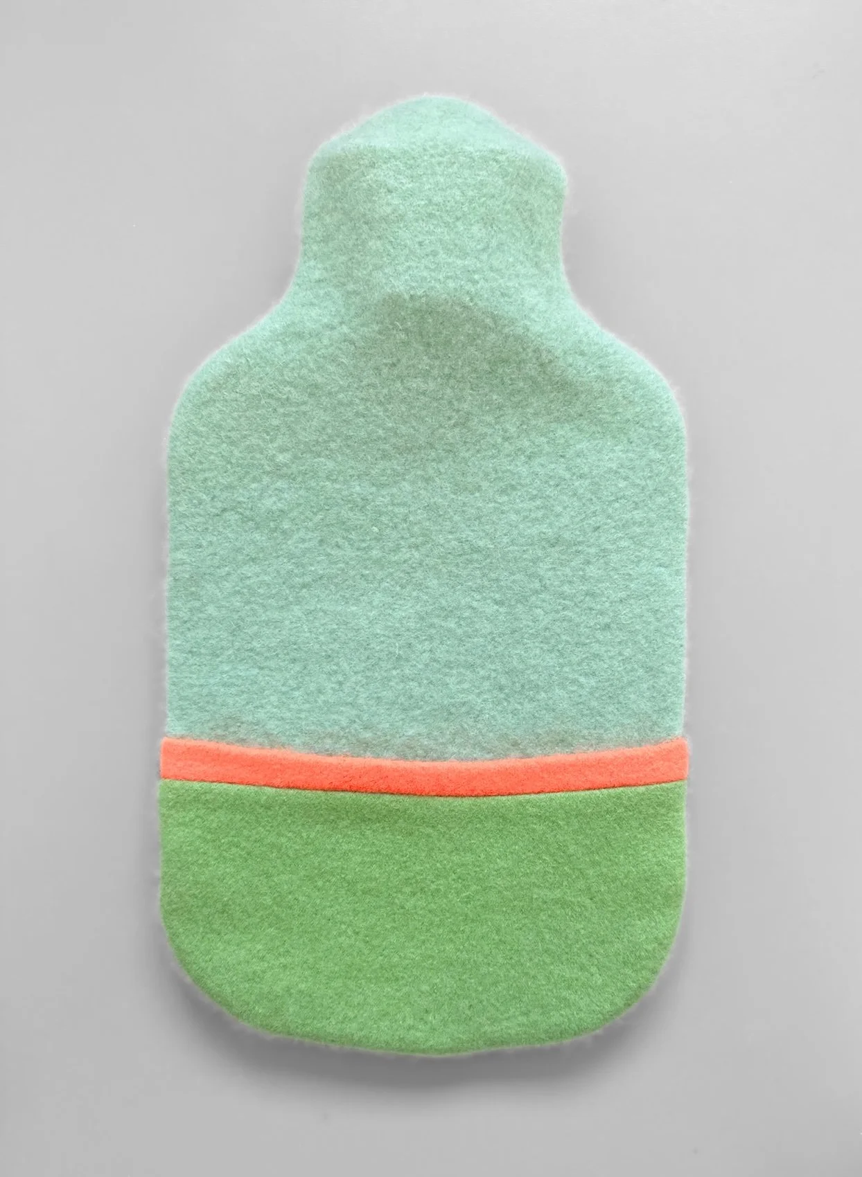 Cashmere hot water bottle in green and aqua.