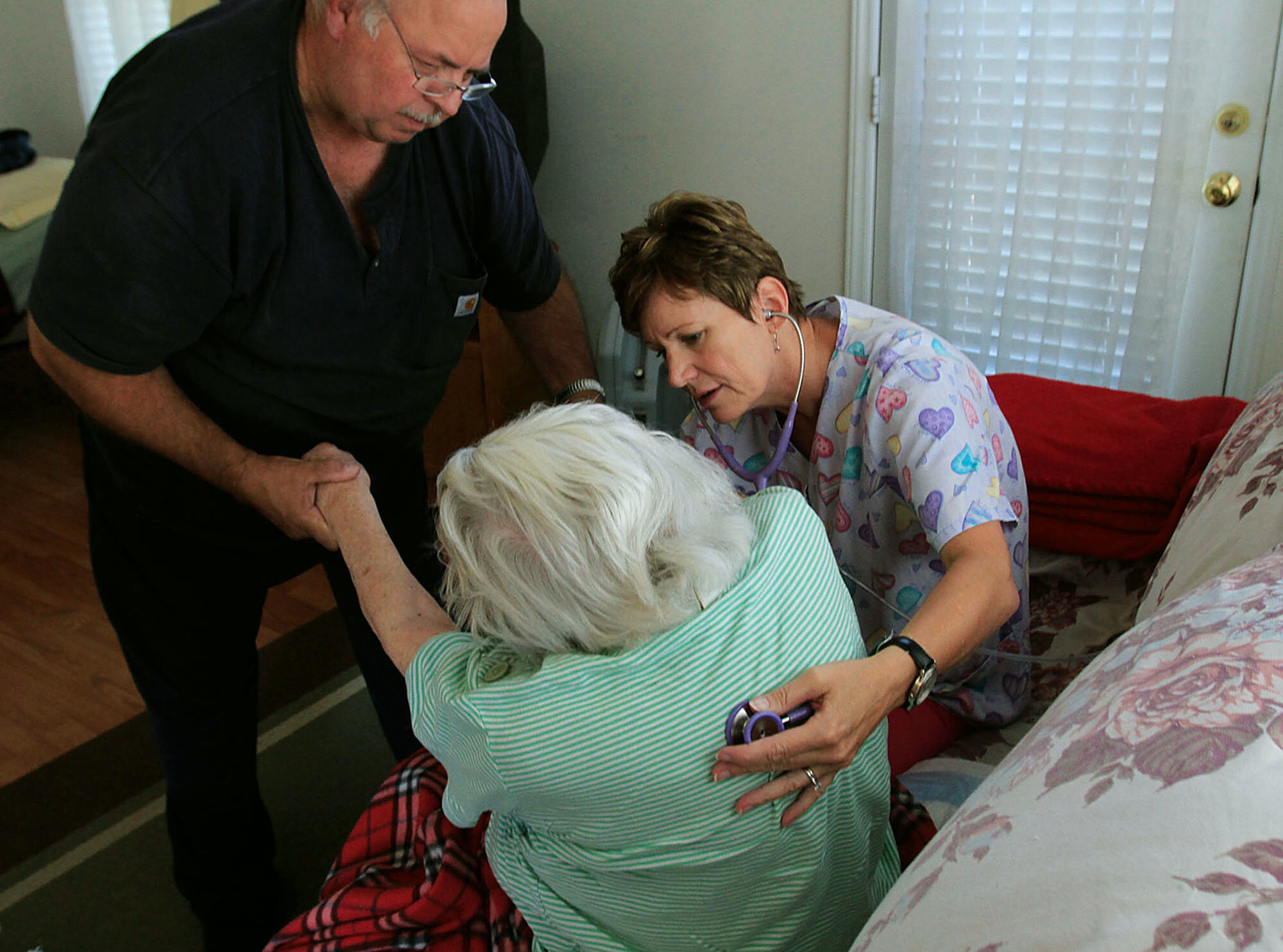  Elizabeth gets a check up with a nurse who comes to her home once a month. 