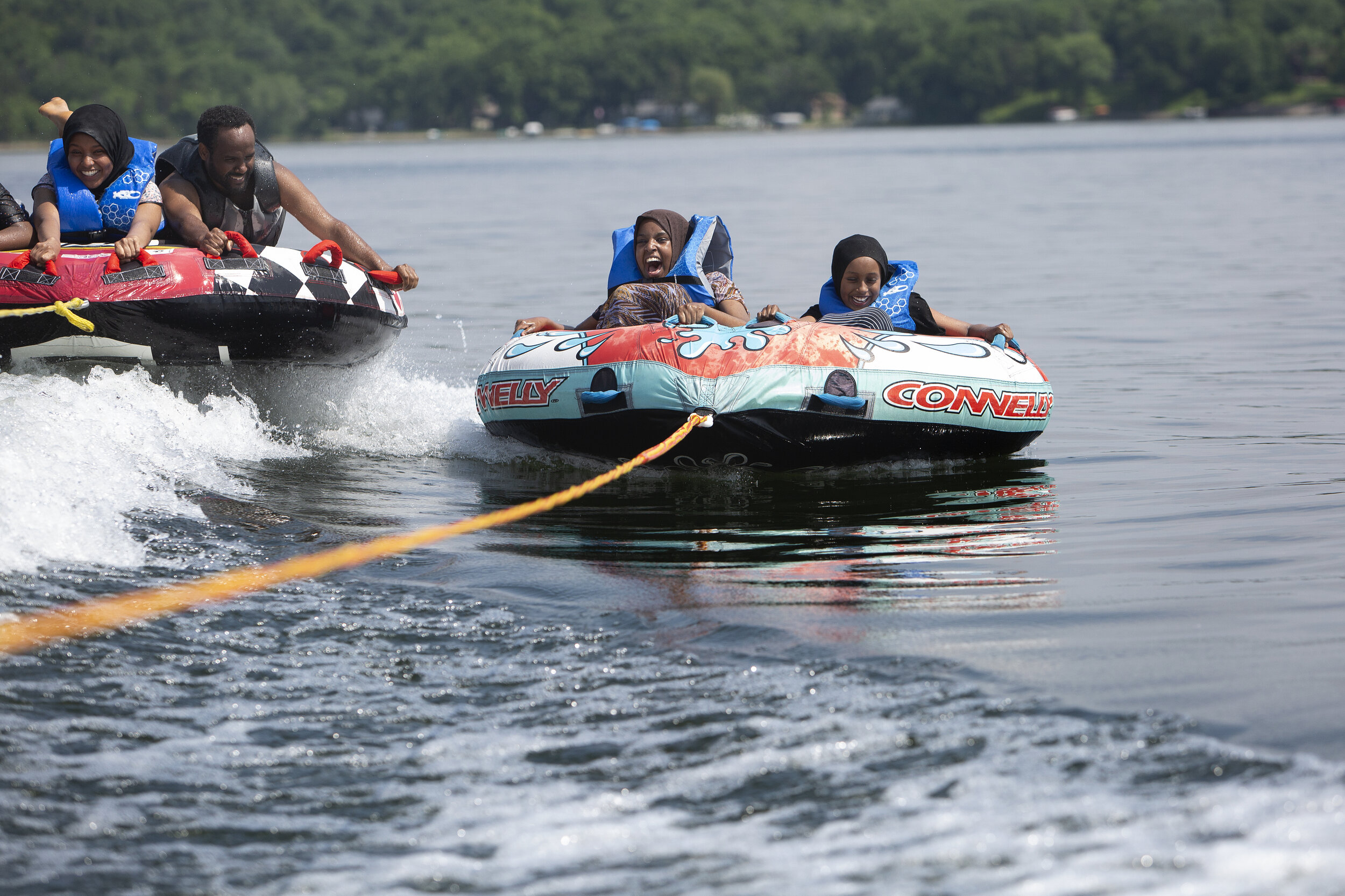  From left, Hafsa Musse, Mahdi Osman, Sucad Yusuf, and Samira Ahmed go water tubing. The summer camp is also a way to change perceptions about who enjoys outdoor recreation,&nbsp;said camp co-founder Mahdi Osman.    