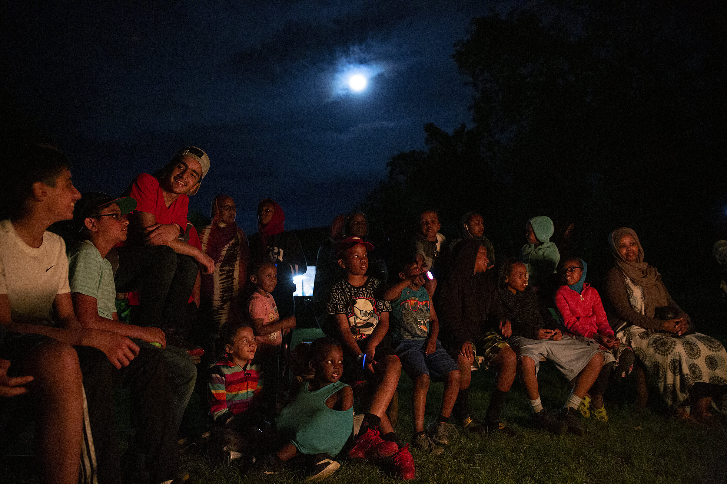  Campers sit around the fire to sing, tell jokes and ghost stories, perform skits and sing inspirational songs. The group gathers at the end of each day as a way to bond and build community. 