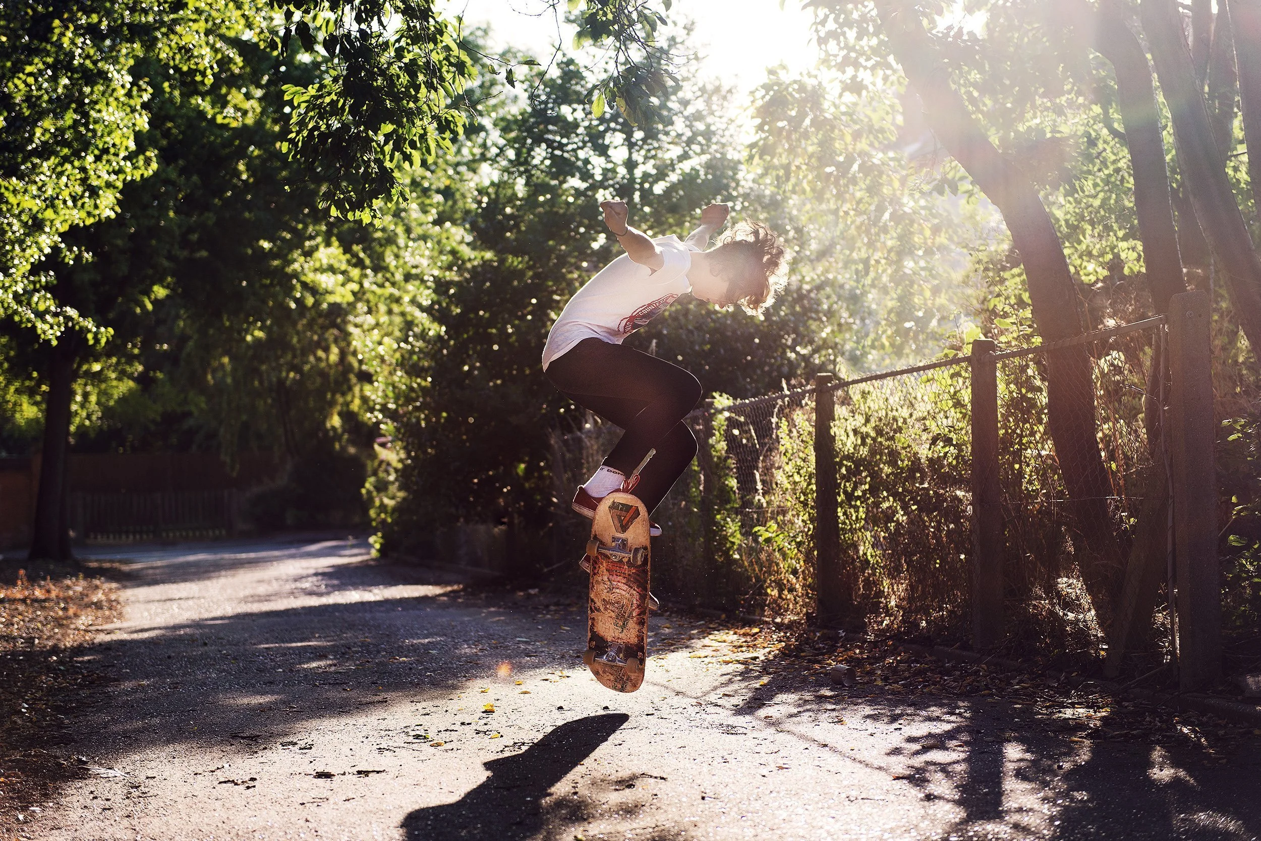 boy+skateboarding+kid+with+sun+flare+nathaniel+rosa.jpg