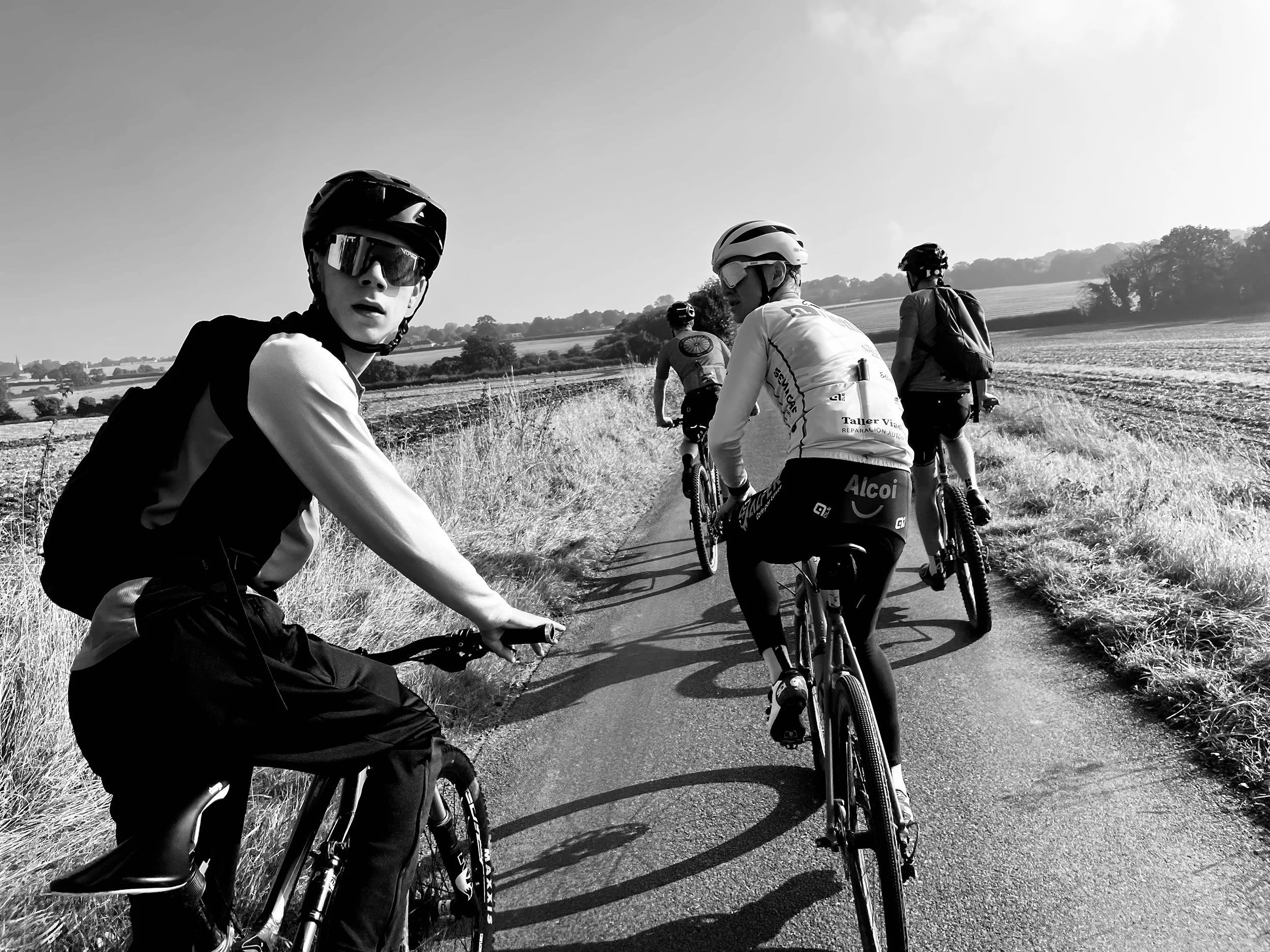young+cyclists+looking+back+at+camera+by+Nathaniel+Rosa+shot+on+iphone.jpg