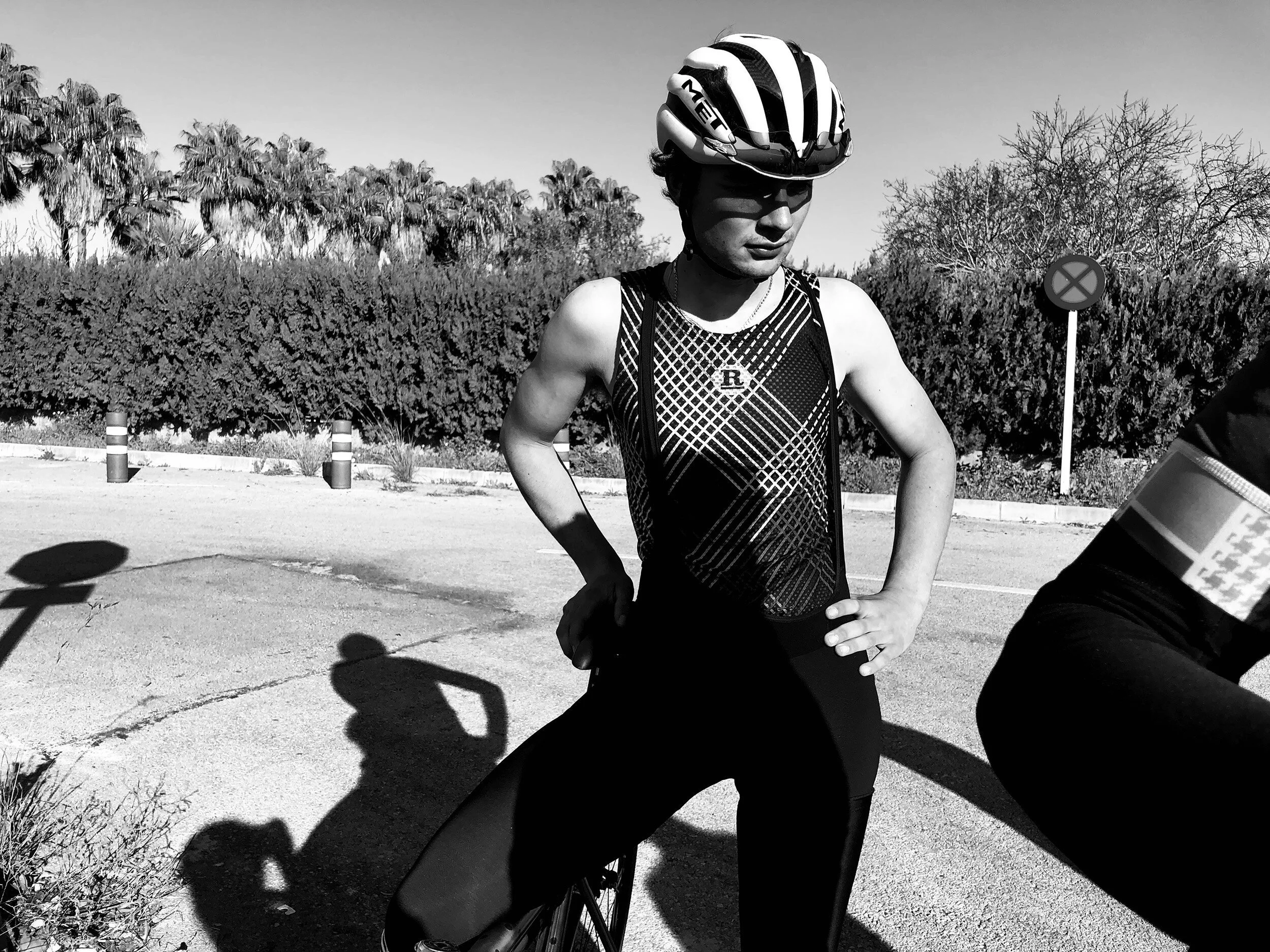 a+cyclist+having+a+rest+by+the+side+of+the+road+by+Nathaniel+Rosa+shot+on+iphone.jpg