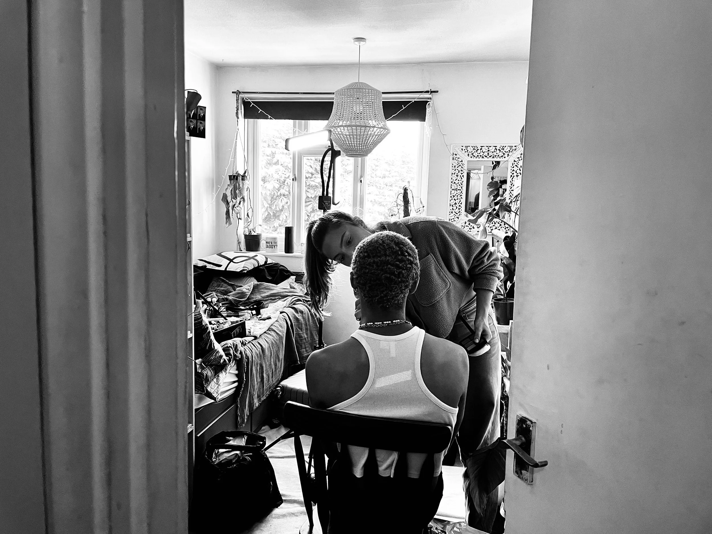 girl+putting+makeup+on+boy+in+a+bedroom+in+london+flat+by+Nathaniel+Rosa+shot+on+iphone.jpg