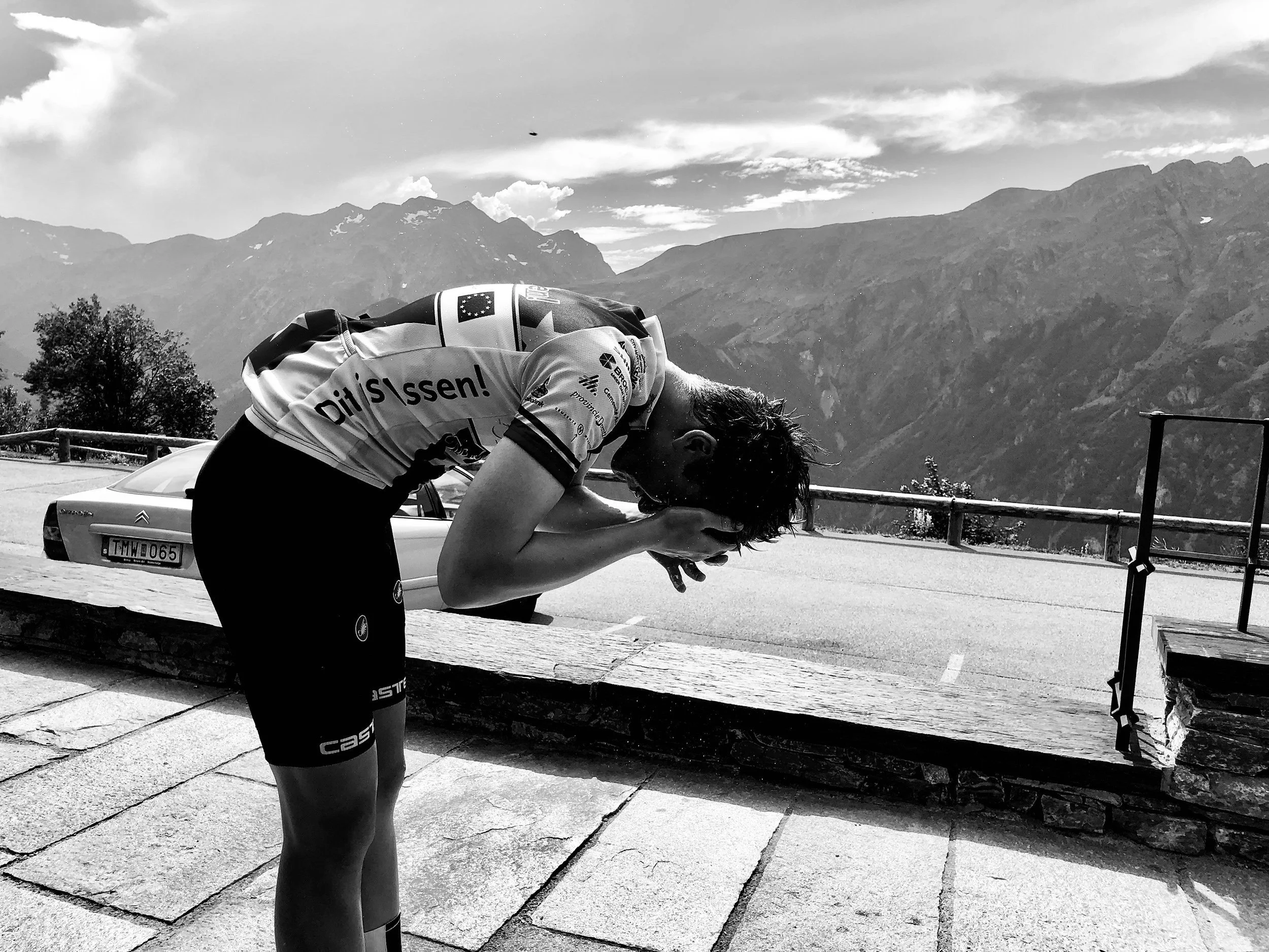 young+cyclist+washes+hair+in+fresh+water+at+the+top+of+a+mountain+by+Nathaniel+Rosa+shot+on+iphone.jpeg