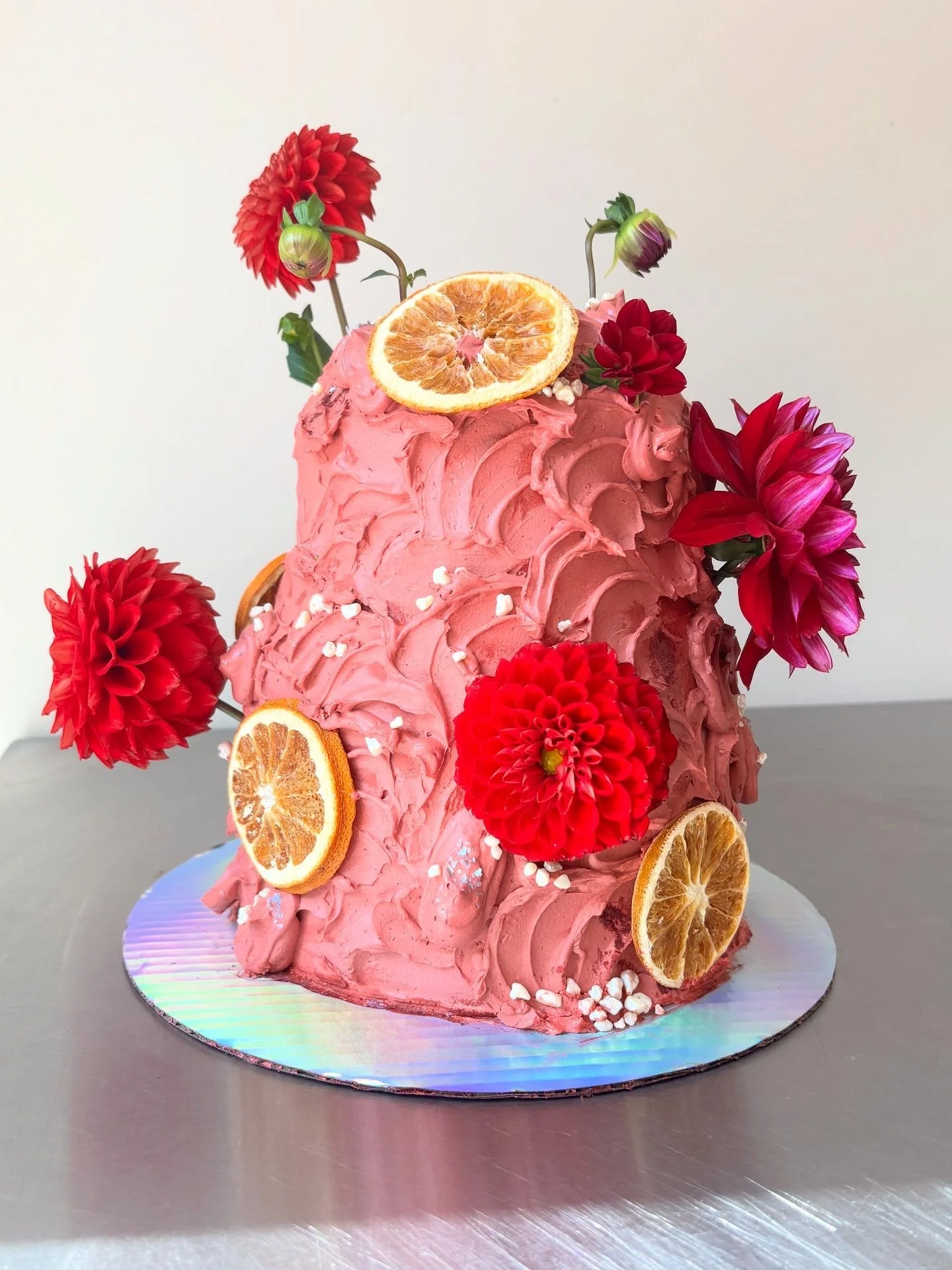 E & J   spiced dark chocolate cake / dark chocolate crumbs / black raspberry jam / brown butter tonka bean buttercream