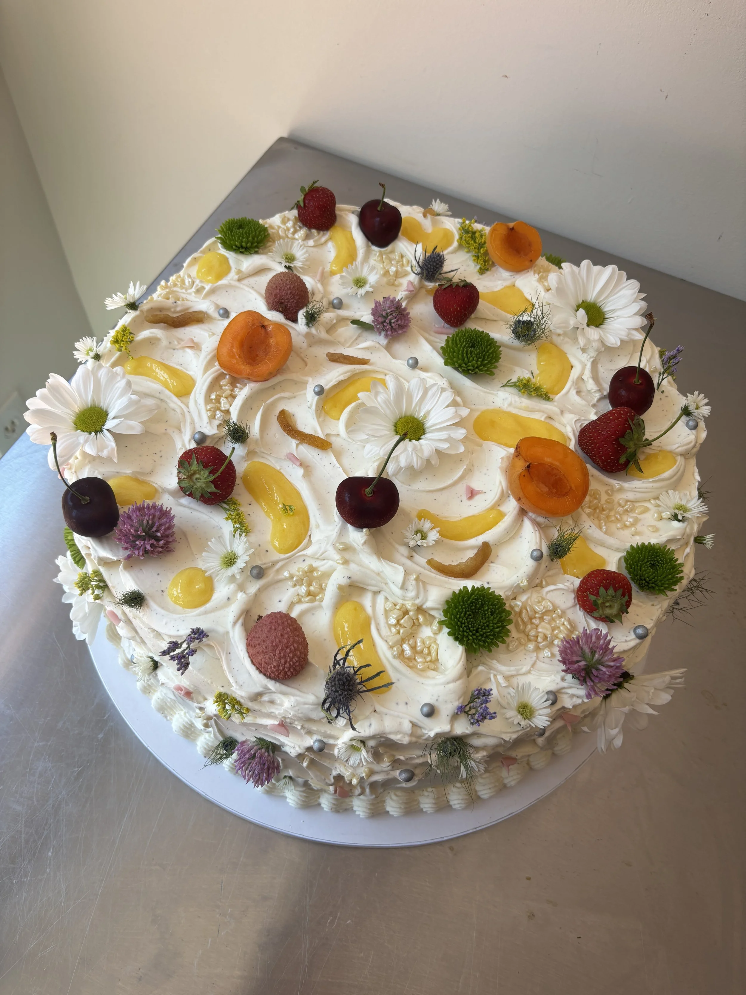 L & C 
passion fruit cake / meyer lemon curd / brown butter tonka bean Swiss meringue buttercream