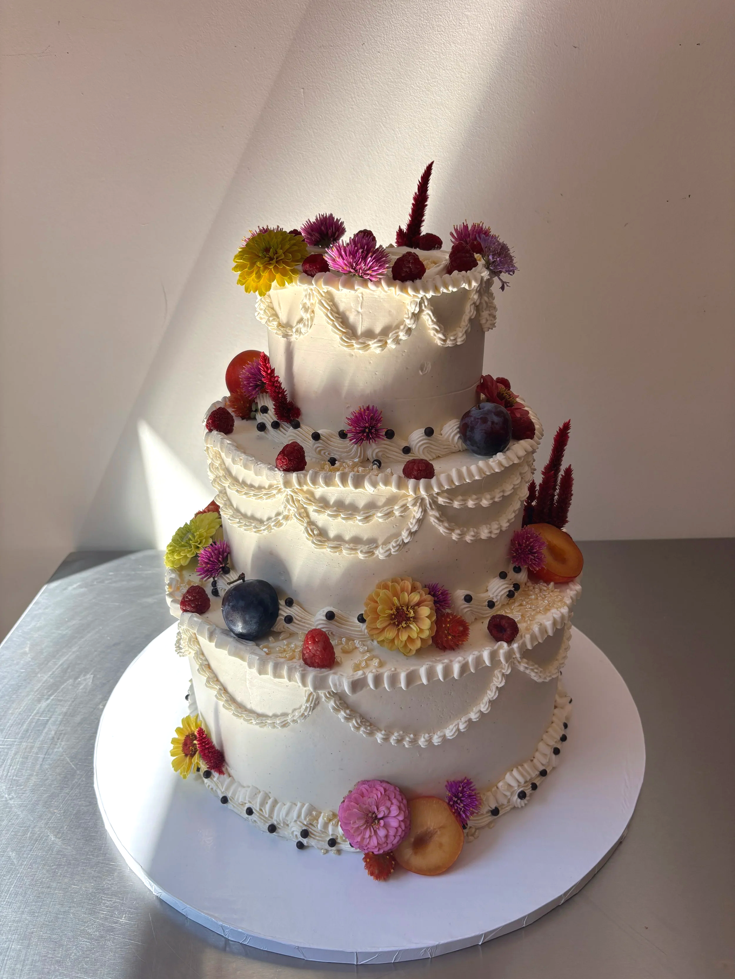 F & H 
dark chocolate cake / malty vanilla swiss meringue buttercream (serves 90)
