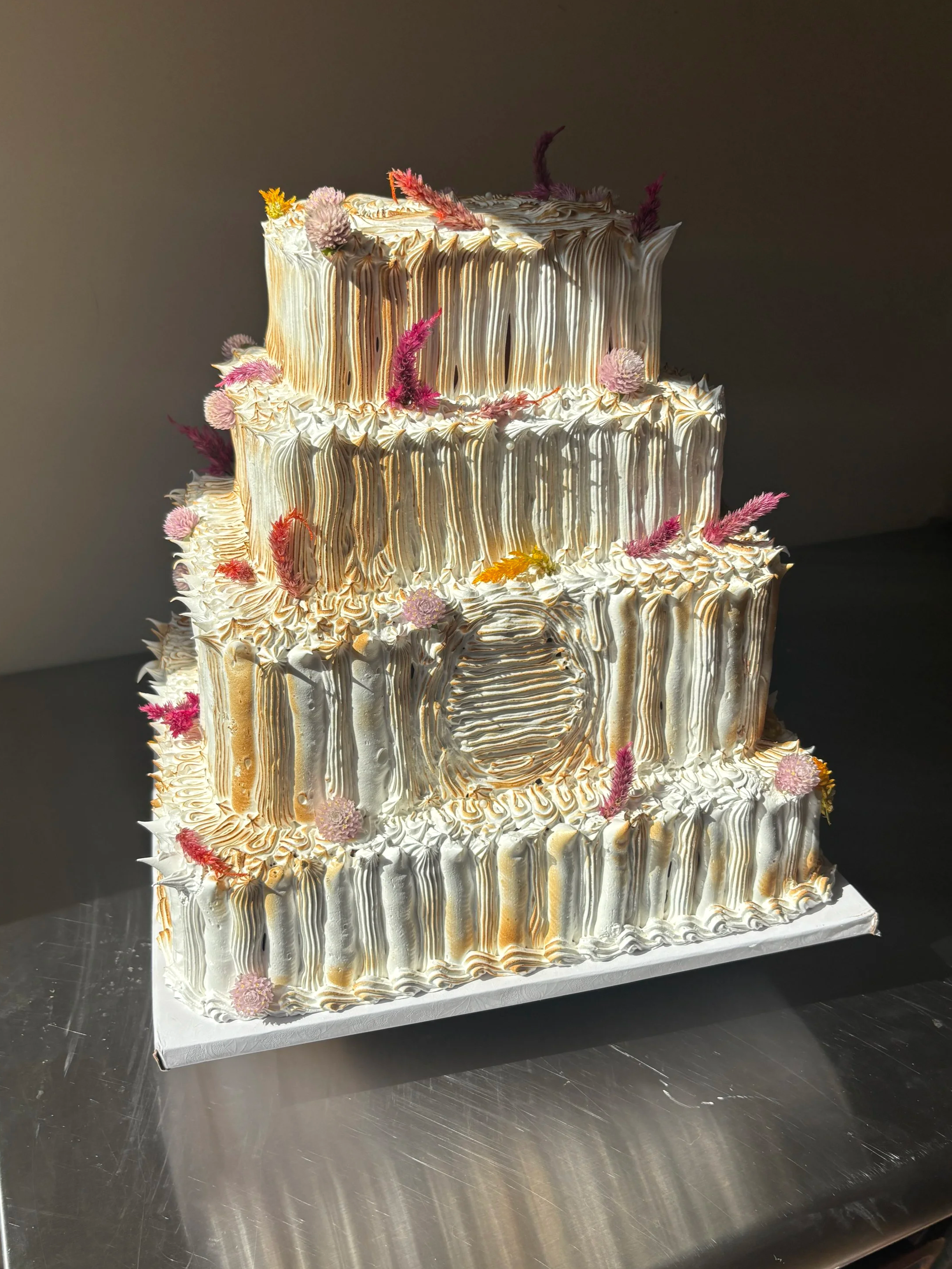 P & C   spiced dark chocolate cake / chocolate hazelnut spread / cardamom mocha buttercream / torched swiss meringue