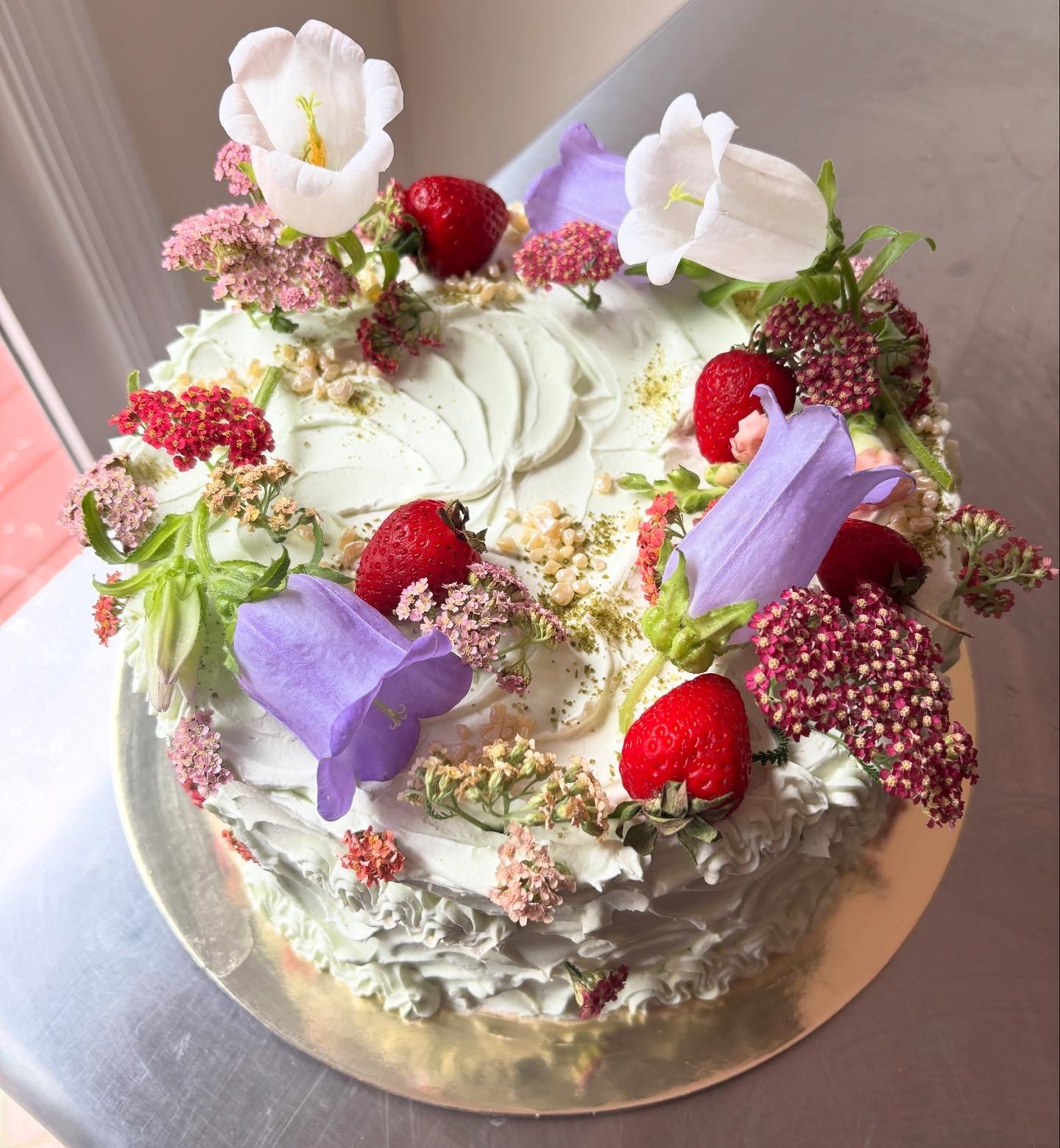 A & M 
meyer lemon turmeric cake / black raspberry jam / basil swiss meringue buttercream (9 inch round)