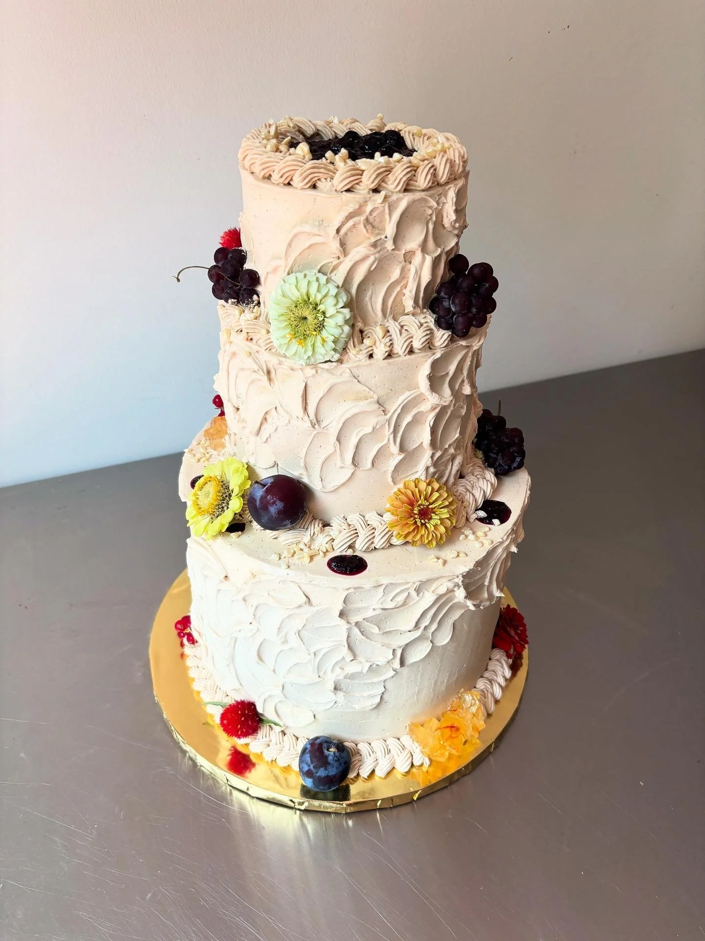 C & E 
passion fruit cake / passion fruit curd / pickled berry jam / dark chocolate and sweet corn crumbs / brown sugar swiss meringue buttercream (serves 50)