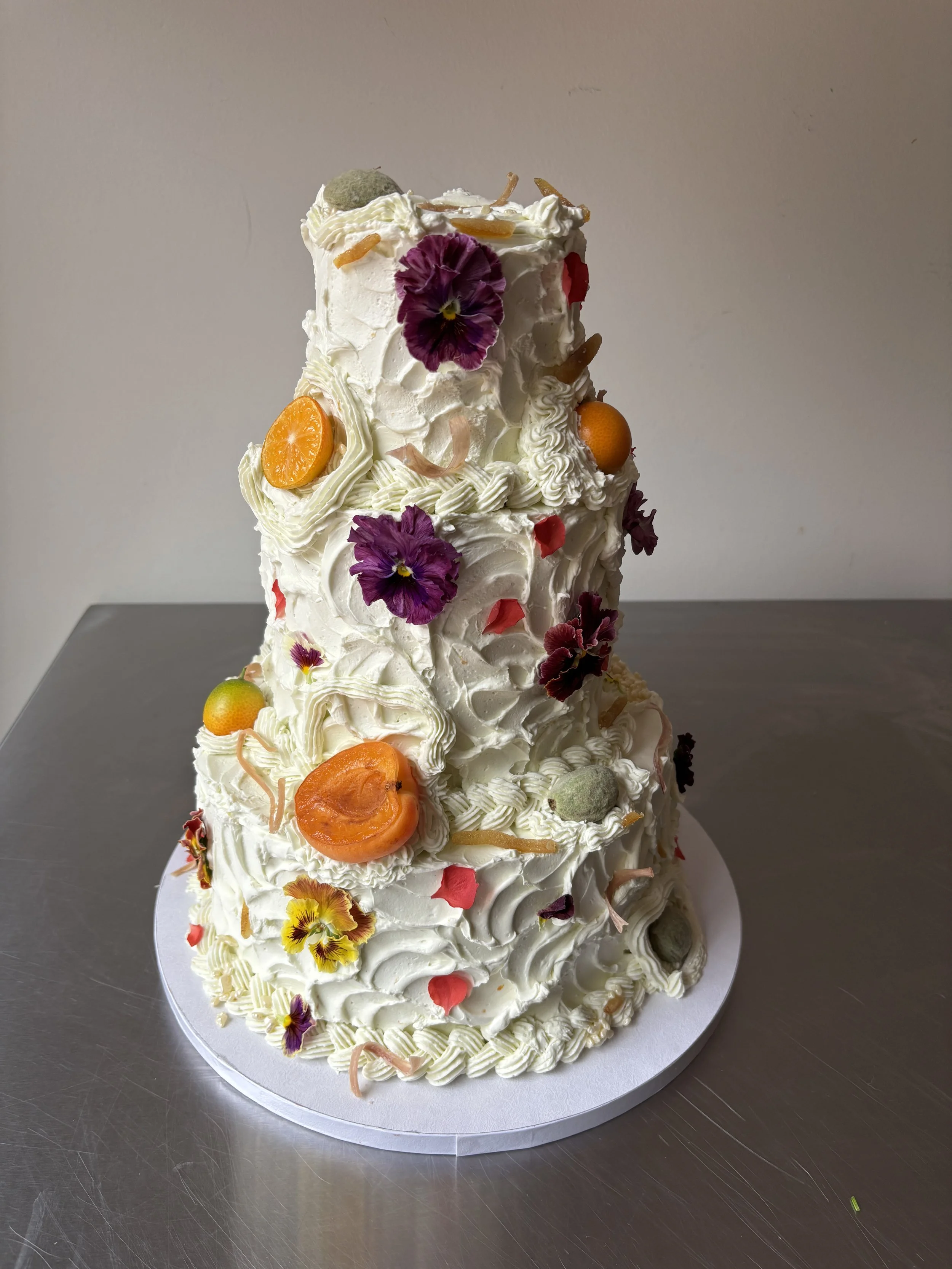 A & J   malted strawberry cake / black sesame cream / vanilla stonefruit jam / basil swiss meringue buttercream