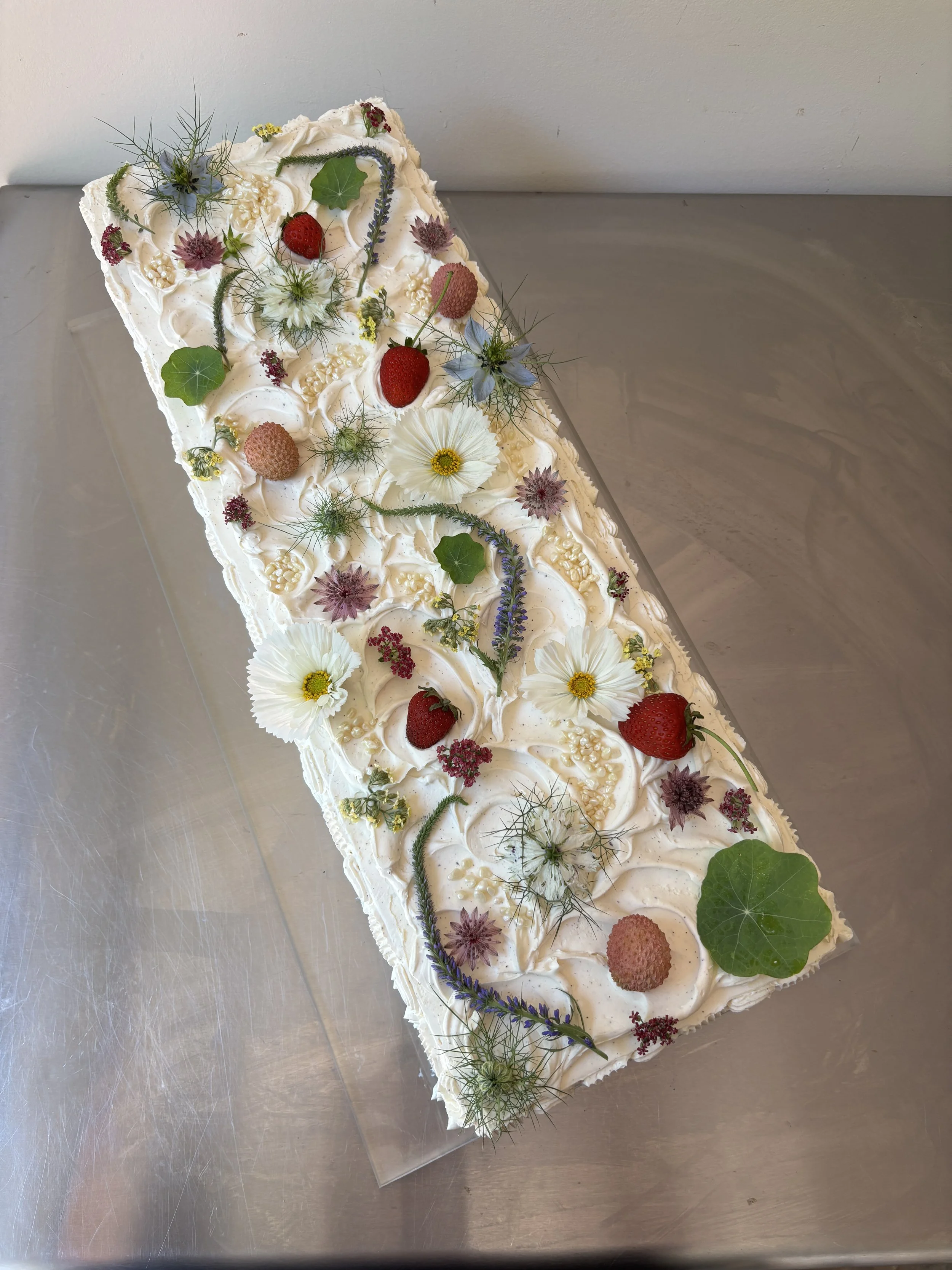 T & H  
passion fruit cake / vanilla stonefruit jam / brown butter tonka bean Swiss meringue buttercream