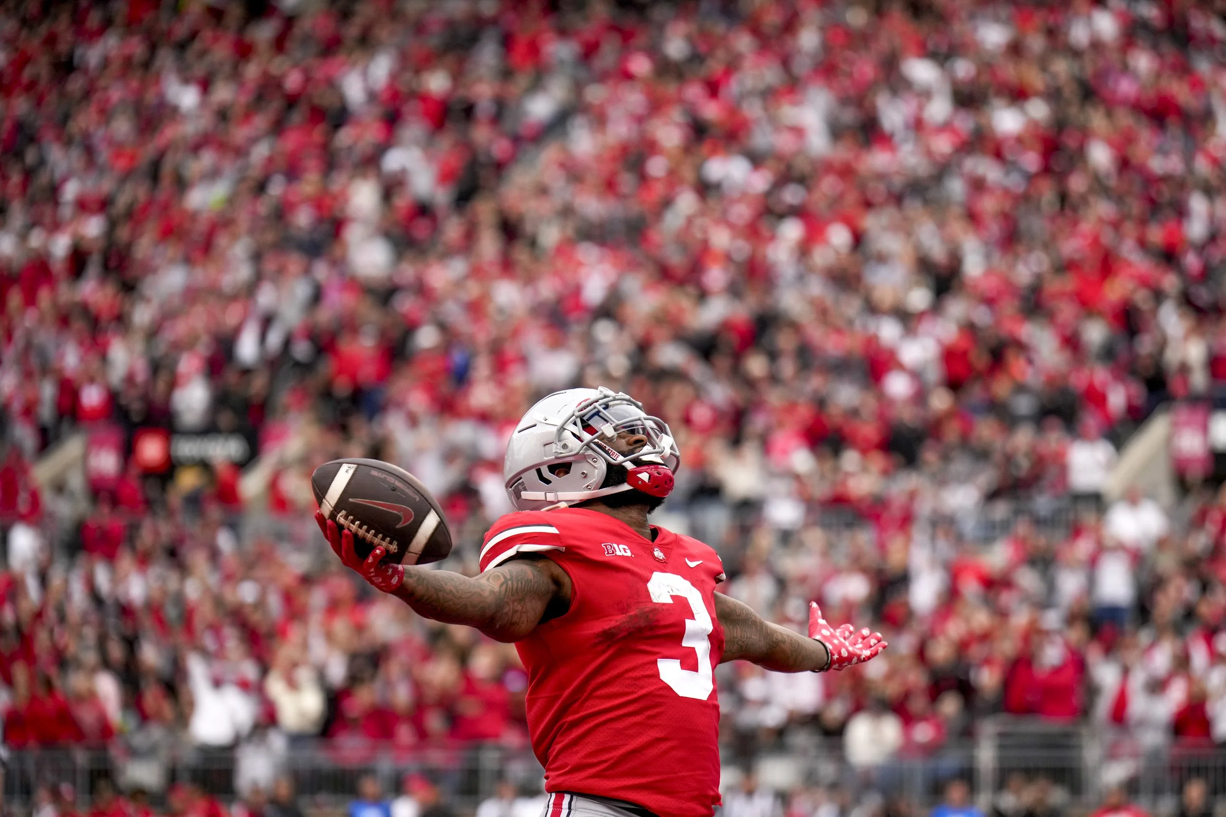  Oct 1, 2022; Columbus, Ohio, USA; Ohio State Buckeyes running back Miyan Williams (3) celebrates after scoring a touchdown during the second quarter of the NCAA Division I football game between the Ohio State Buckeyes and the Rutgers Scarlet Knights