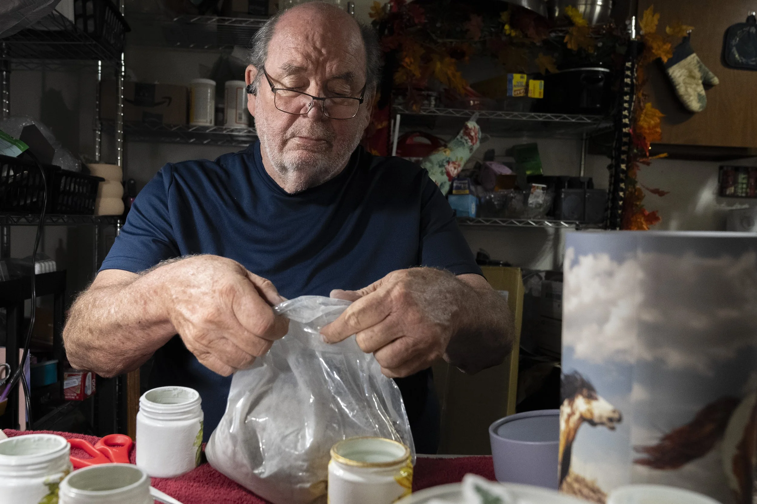  After briefly fighting back tears, Wayne divides Lynne’s ashes into small containers for family members. Wayne moved out of their home almost immediately after Lynne’s death. She was cremated without a funeral. 